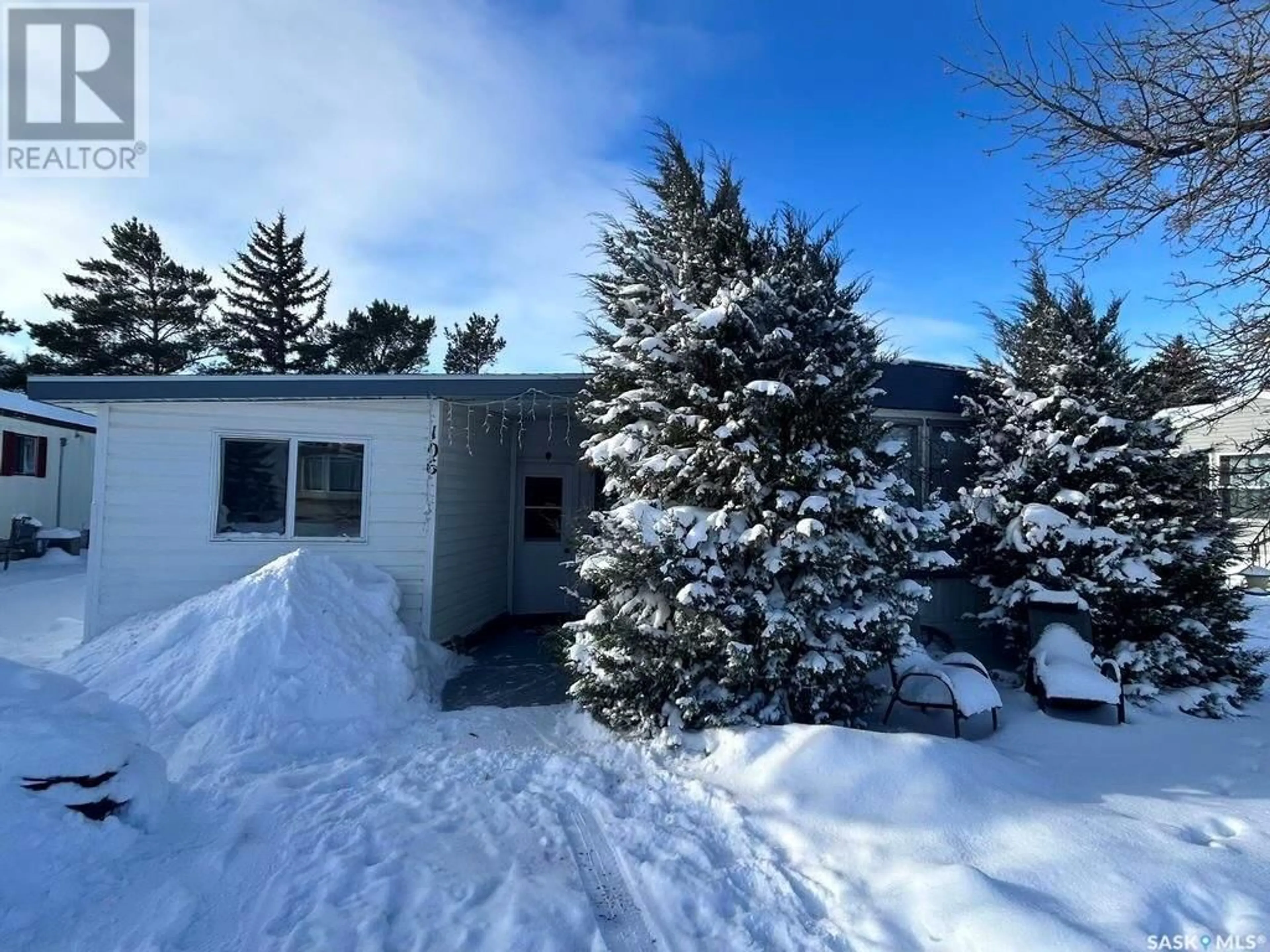 A pic from exterior of the house or condo, the fenced backyard for 106 Spruce STREET, Caronport Saskatchewan S0H0S0