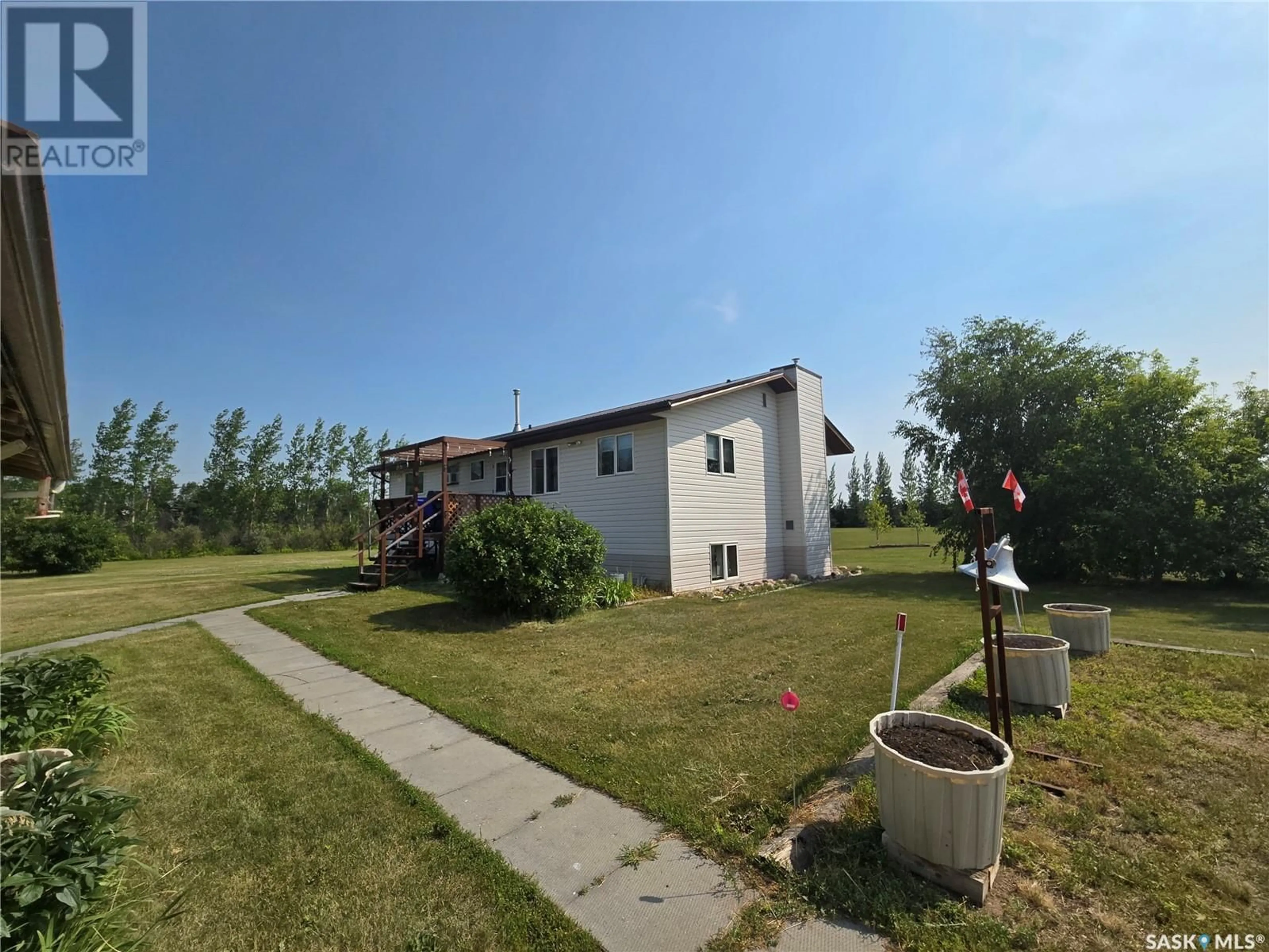 A pic from exterior of the house or condo, the fenced backyard for Lemon Acreage, Kingsley Rm No. 124 Saskatchewan S0G2S0