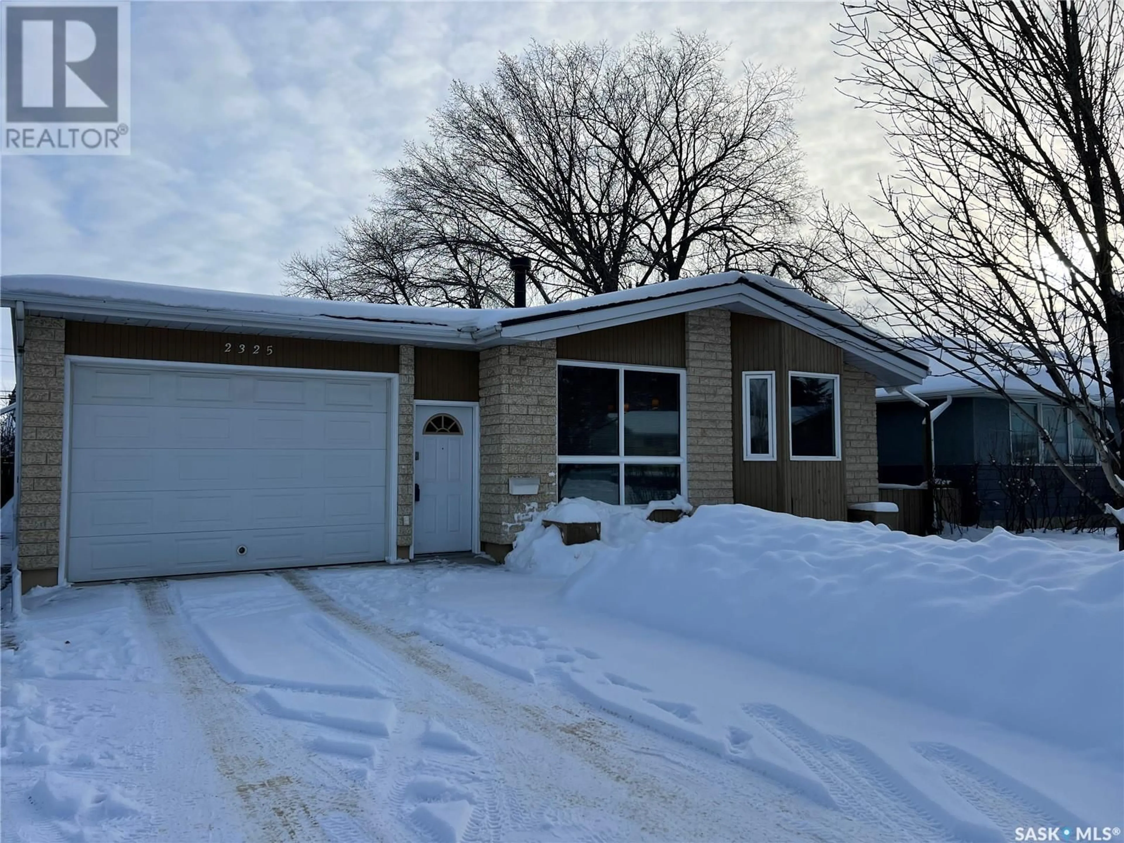 Frontside or backside of a home, cottage for 2325 Clarence AVENUE S, Saskatoon Saskatchewan S7J1L8