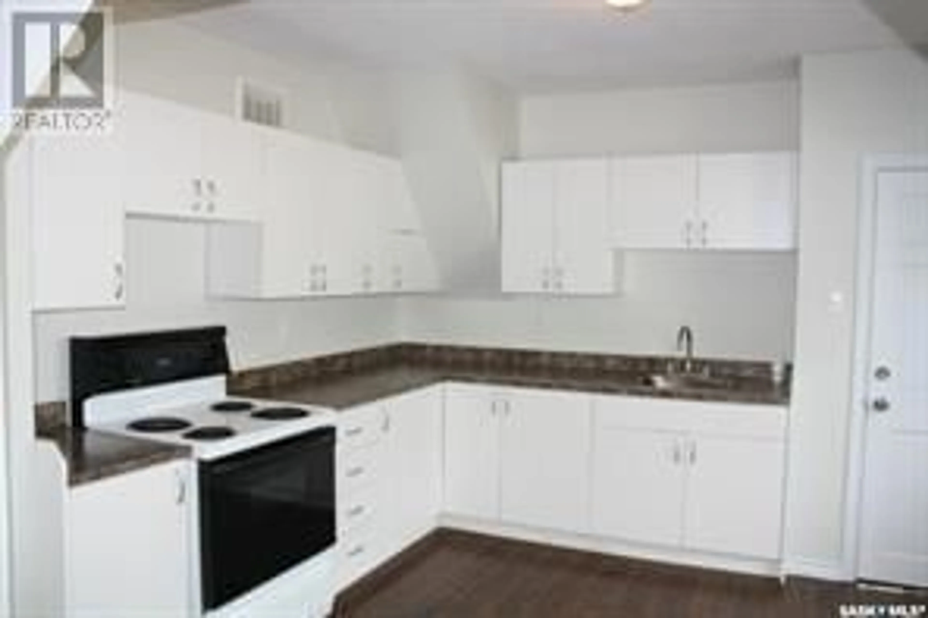 Standard kitchen, wood floors, cottage for 1111 23rd STREET W, Saskatoon Saskatchewan S7L0A7