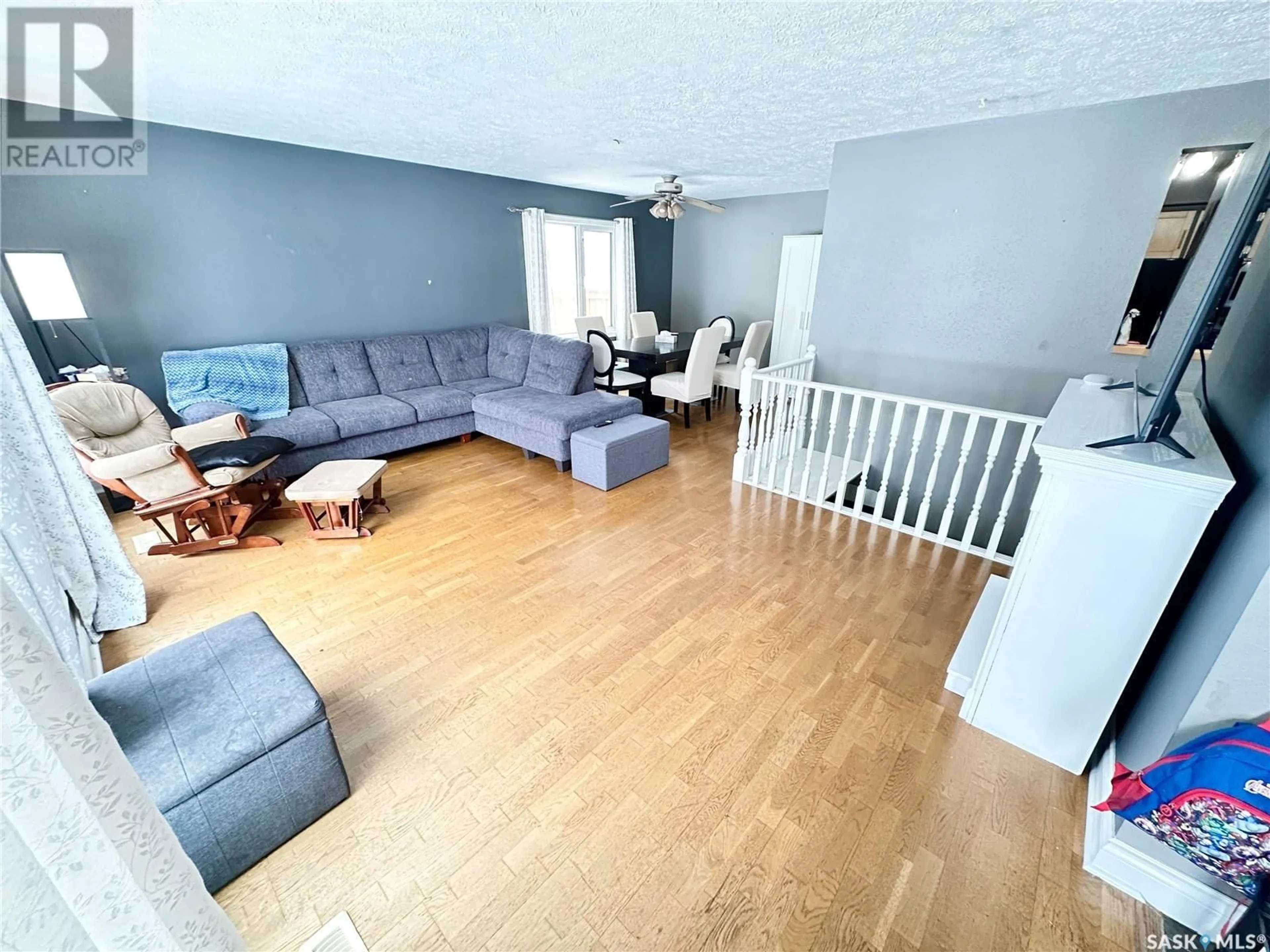 A pic of a room, wood floors for 748 Brimacombe DRIVE, Weyburn Saskatchewan S4H2P8