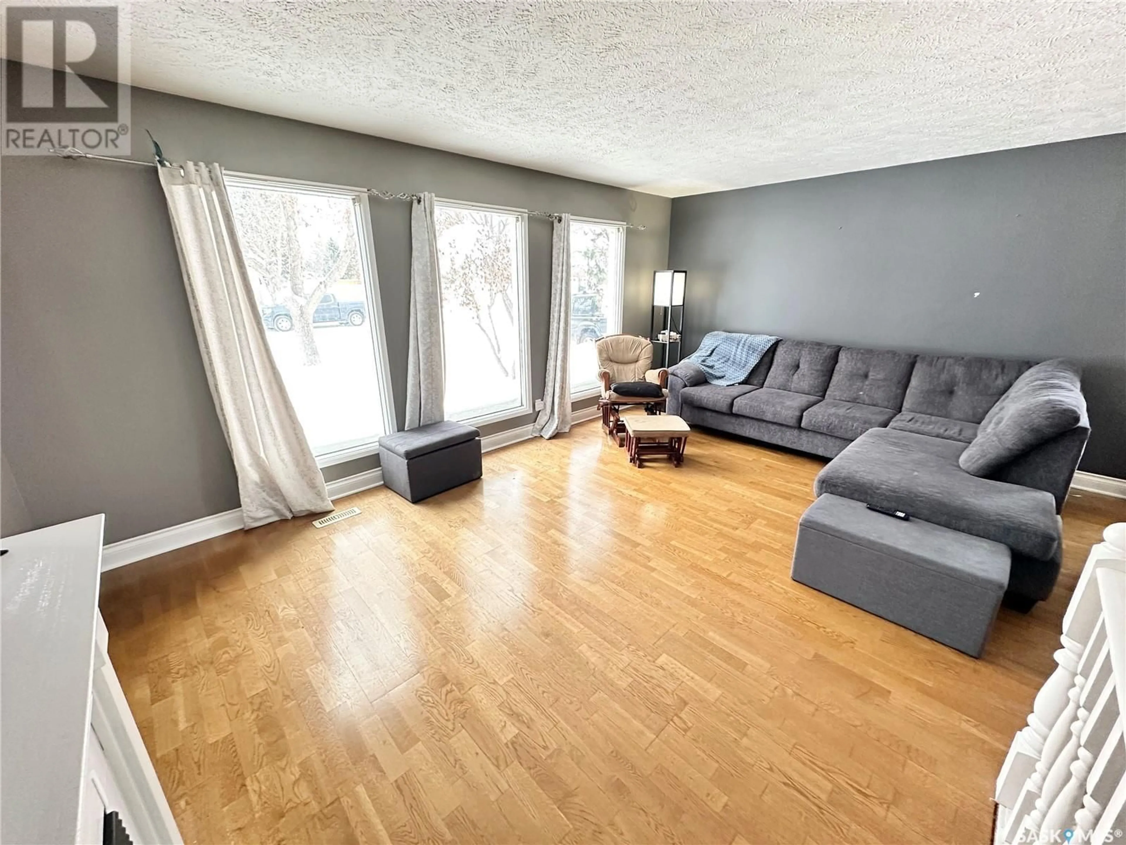 A pic of a room, wood floors for 748 Brimacombe DRIVE, Weyburn Saskatchewan S4H2P8