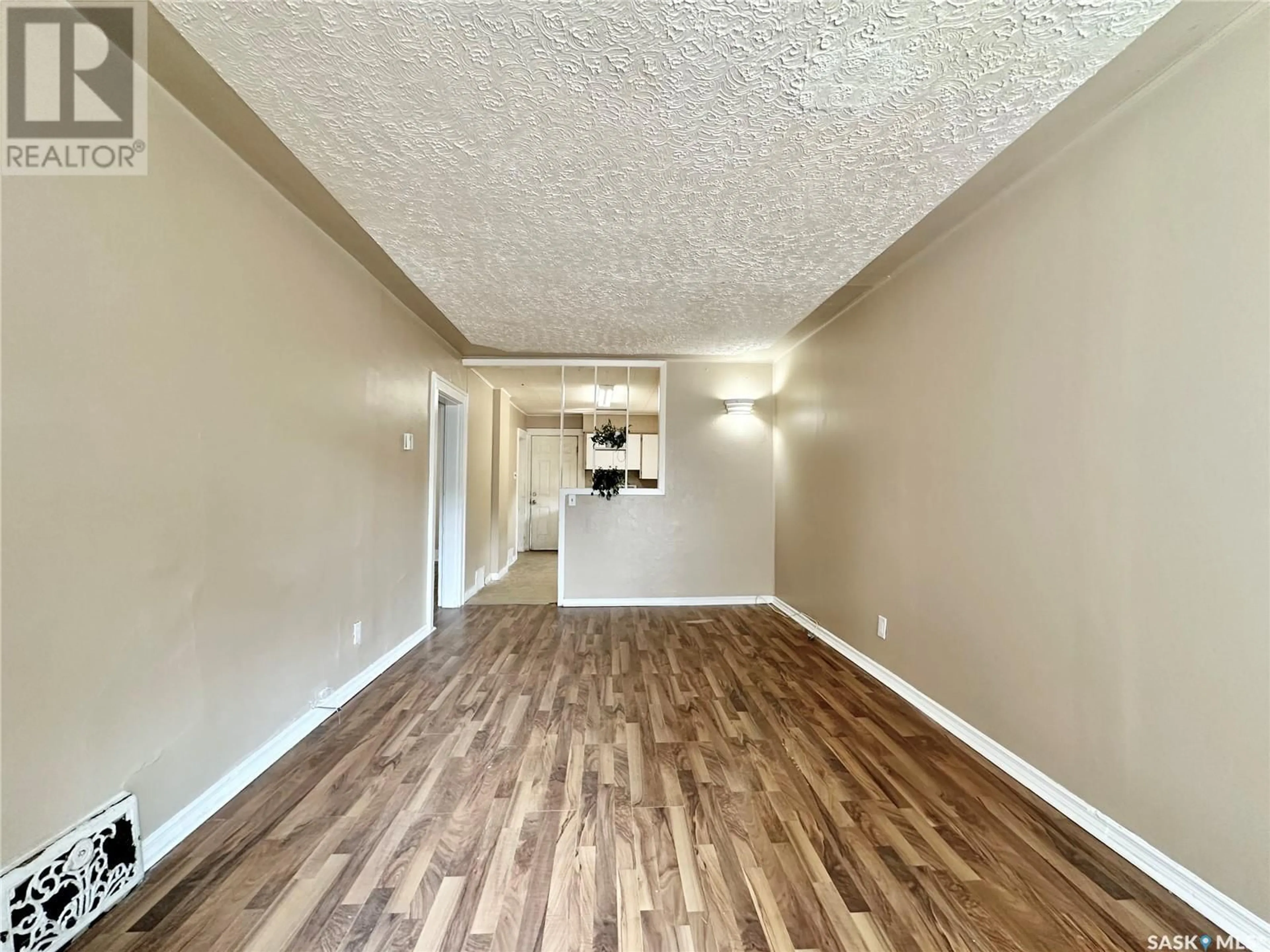 A pic of a room, wood floors for 1957 Quebec STREET, Regina Saskatchewan S4P1J8