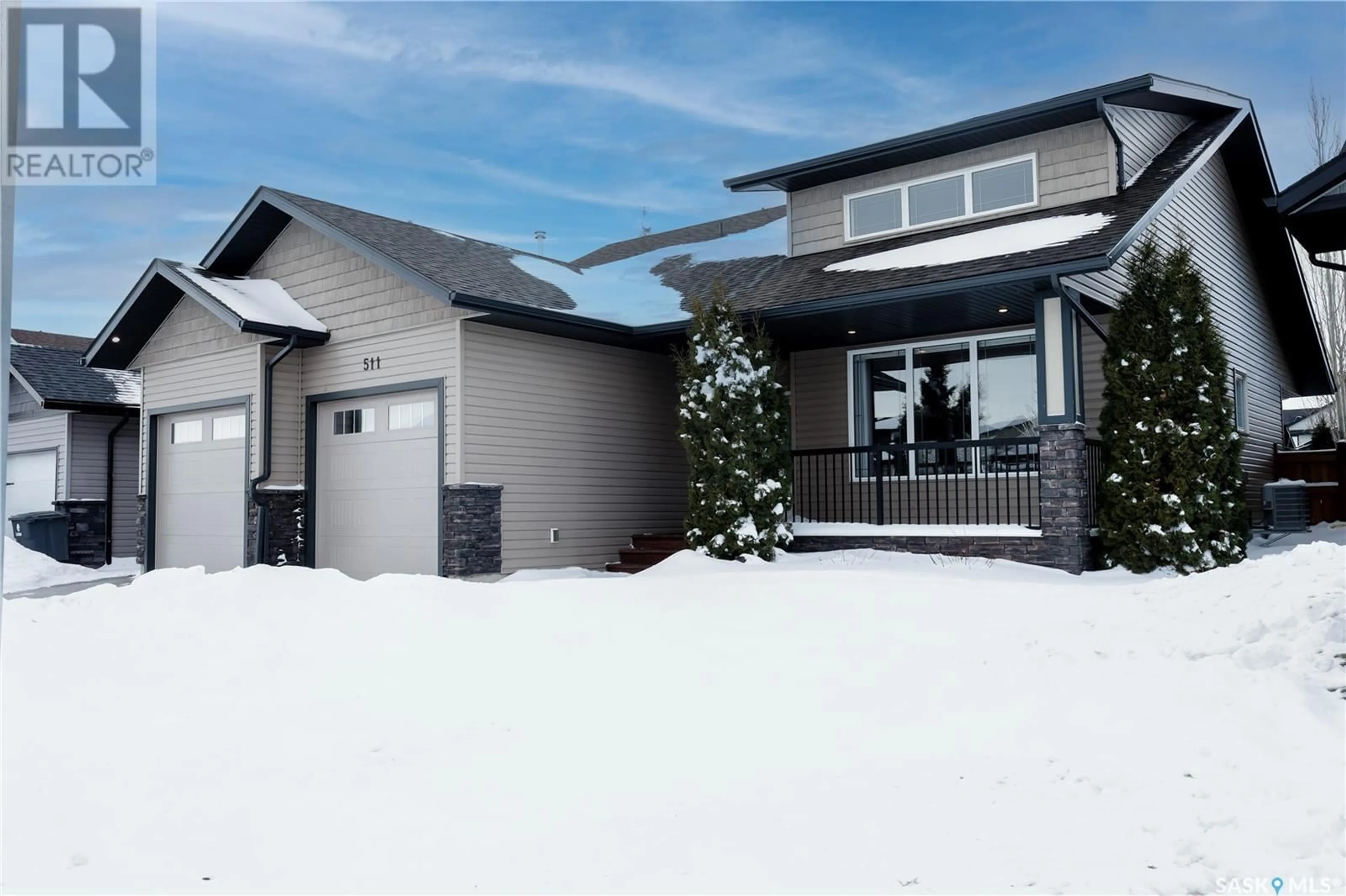 Frontside or backside of a home, cottage for 511 Cherry LANE, Warman Saskatchewan S0K4S2