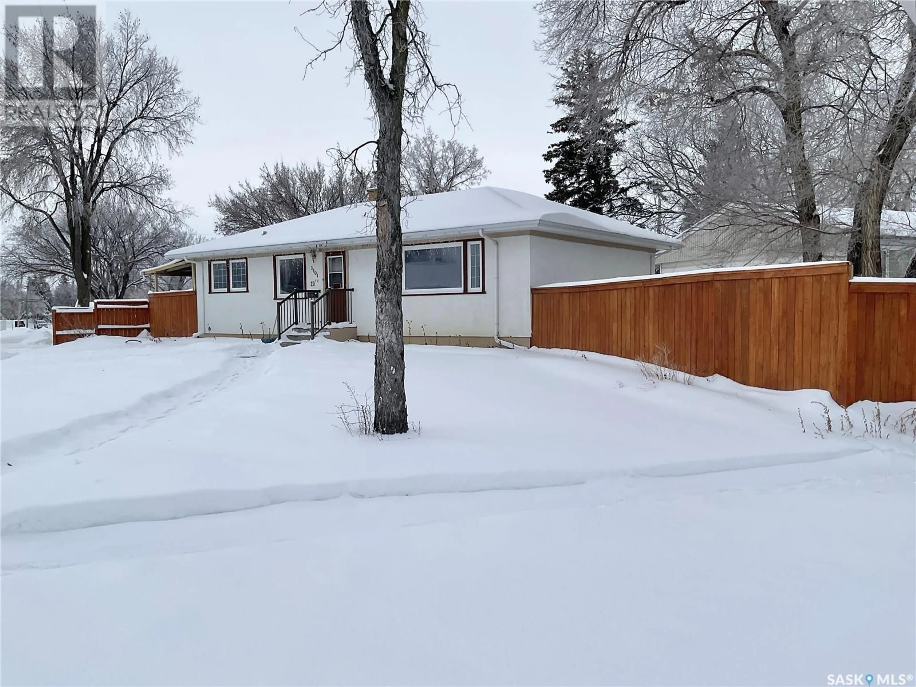 Frontside or backside of a home, the fenced backyard for 3801 20TH AVENUE, Regina Saskatchewan S4S0P3