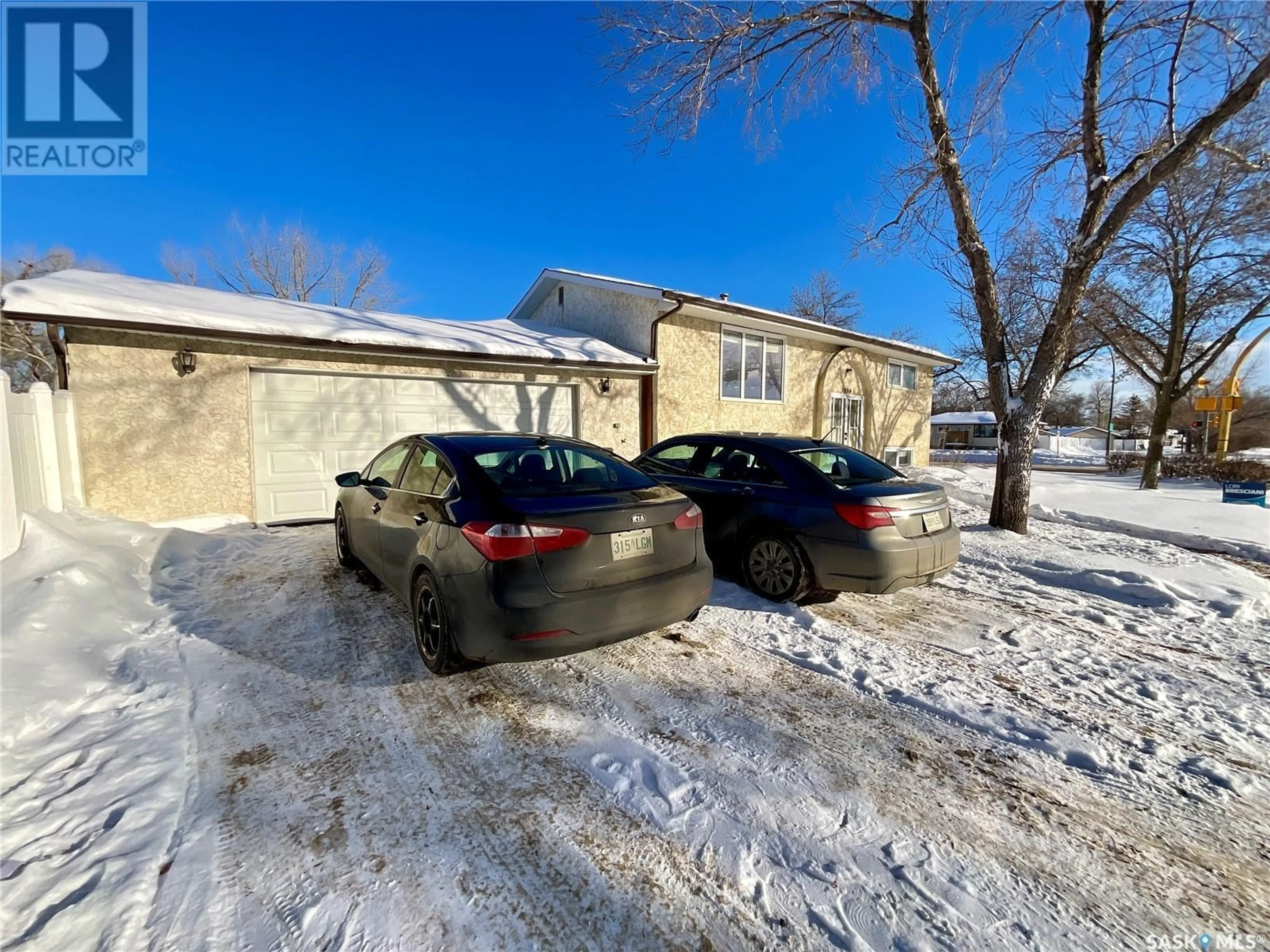 Frontside or backside of a home, the street view for 6006 1ST AVENUE N, Regina Saskatchewan S4T6Z7