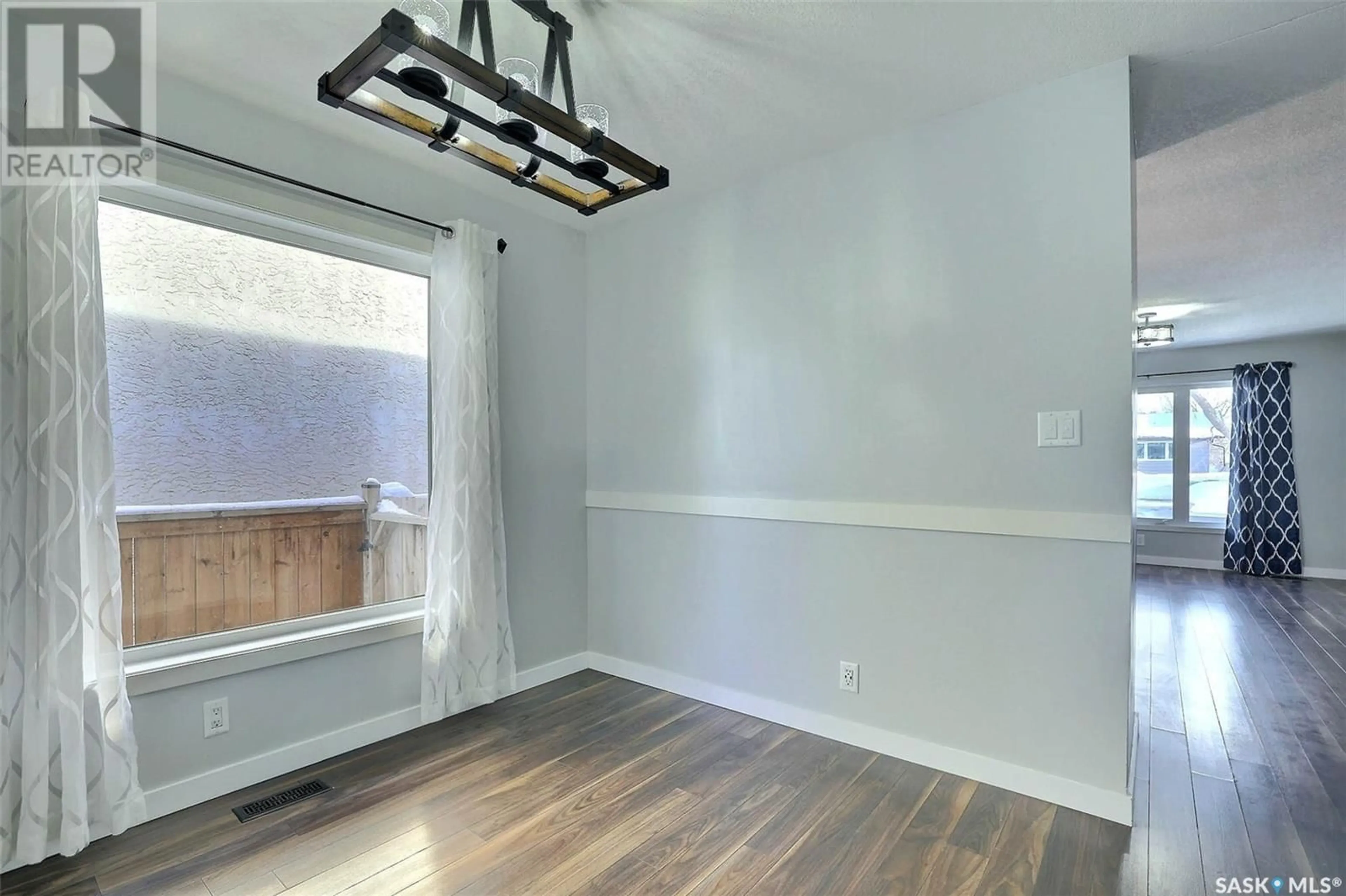 A pic of a room, wood floors for 26 Carter CRESCENT, Regina Saskatchewan S4X2C7