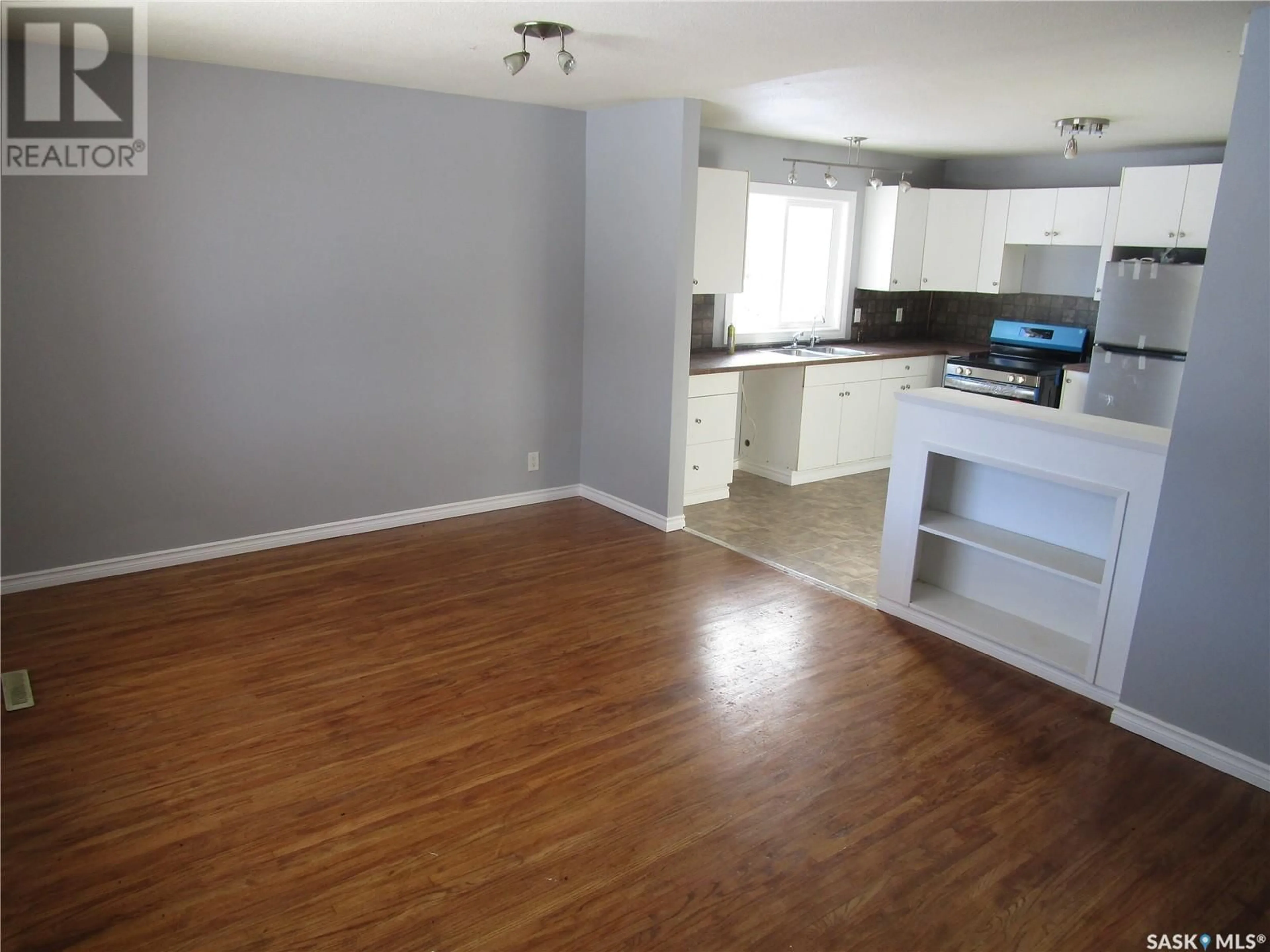 A pic of a room, wood floors for 810 Robinson STREET, Regina Saskatchewan S4T2M3