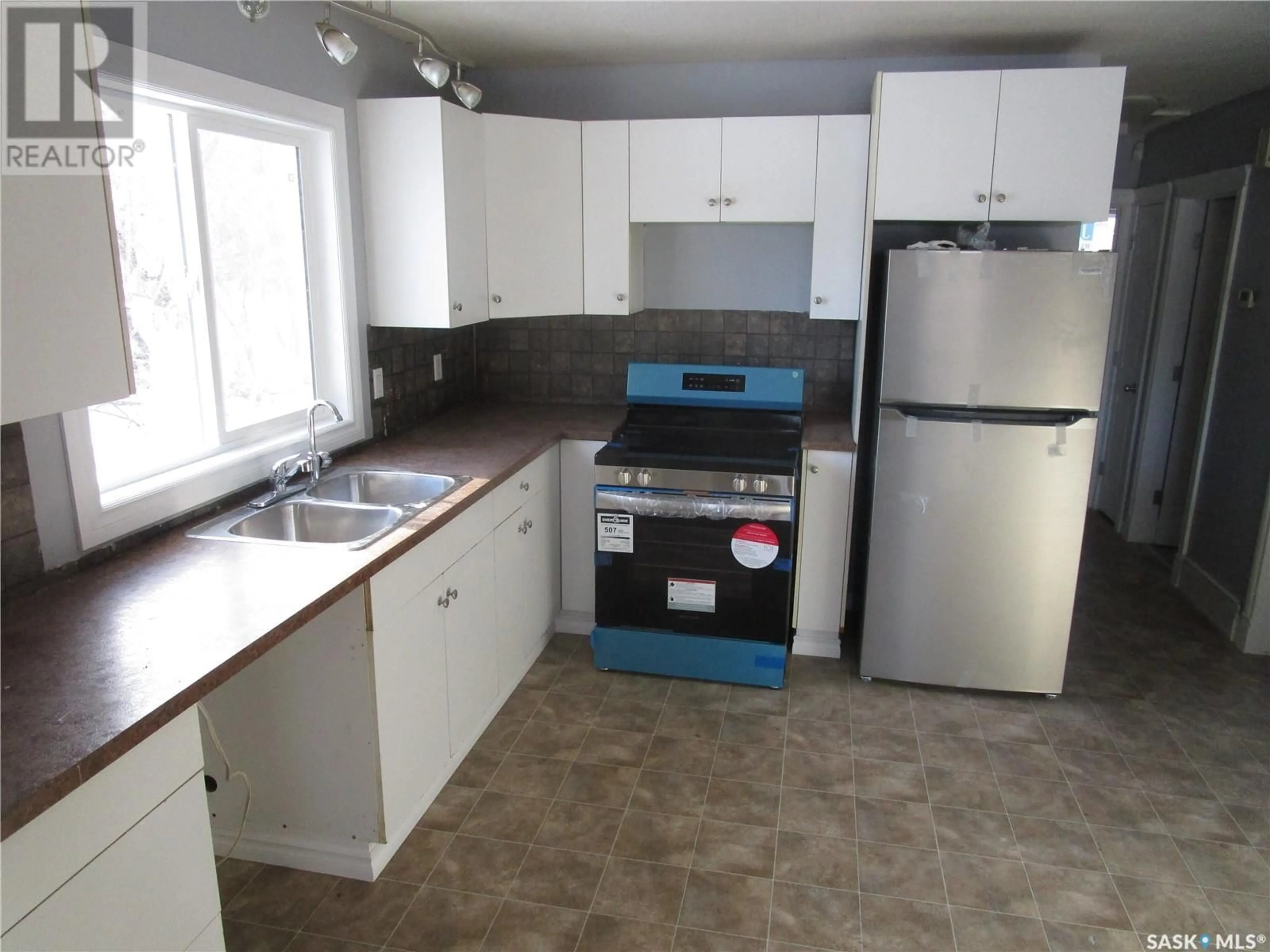 Standard kitchen, wood floors, cottage for 810 Robinson STREET, Regina Saskatchewan S4T2M3