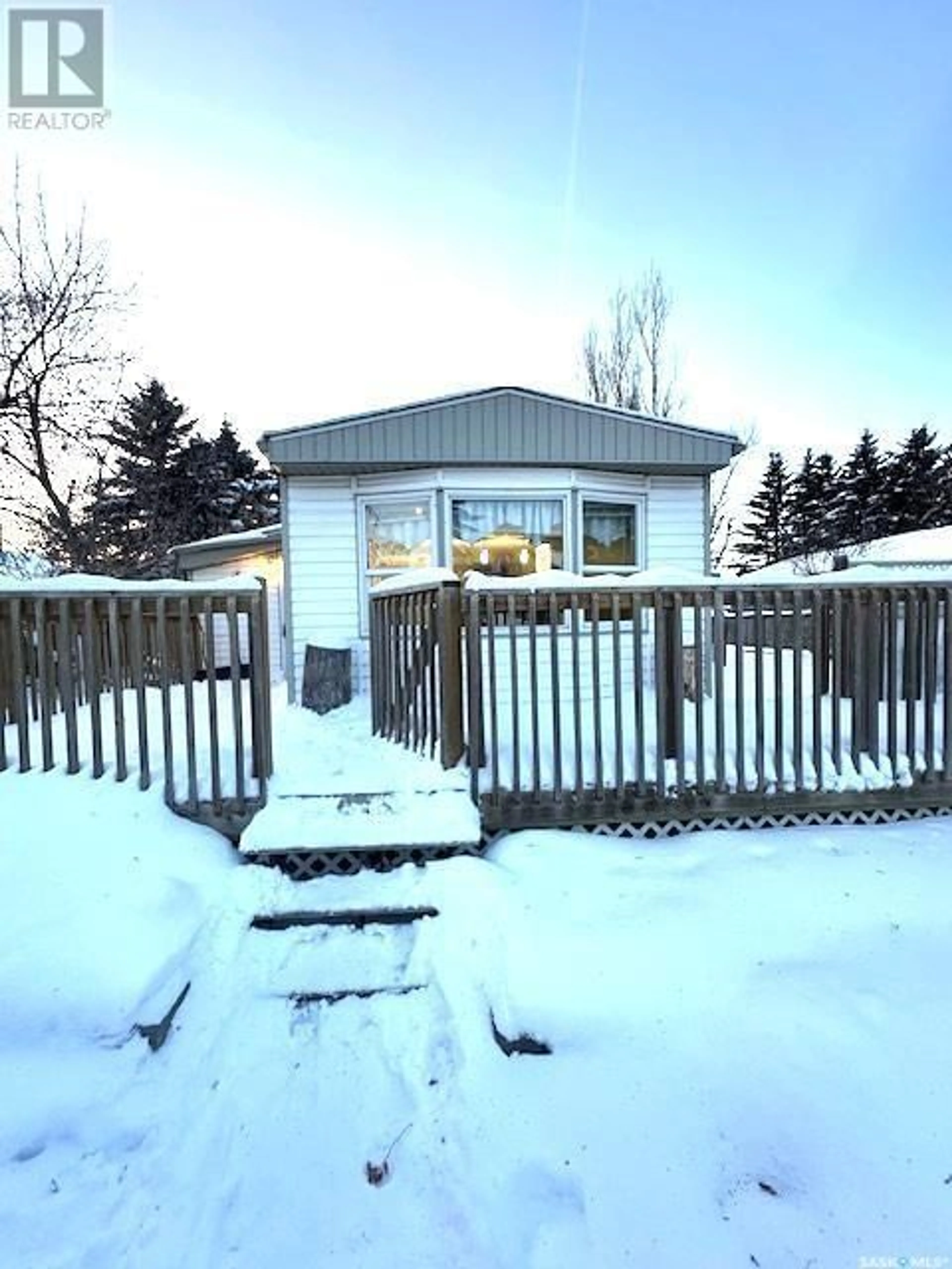 A pic from exterior of the house or condo, the fenced backyard for 330 2nd STREET, Mclean Saskatchewan S0G3E0