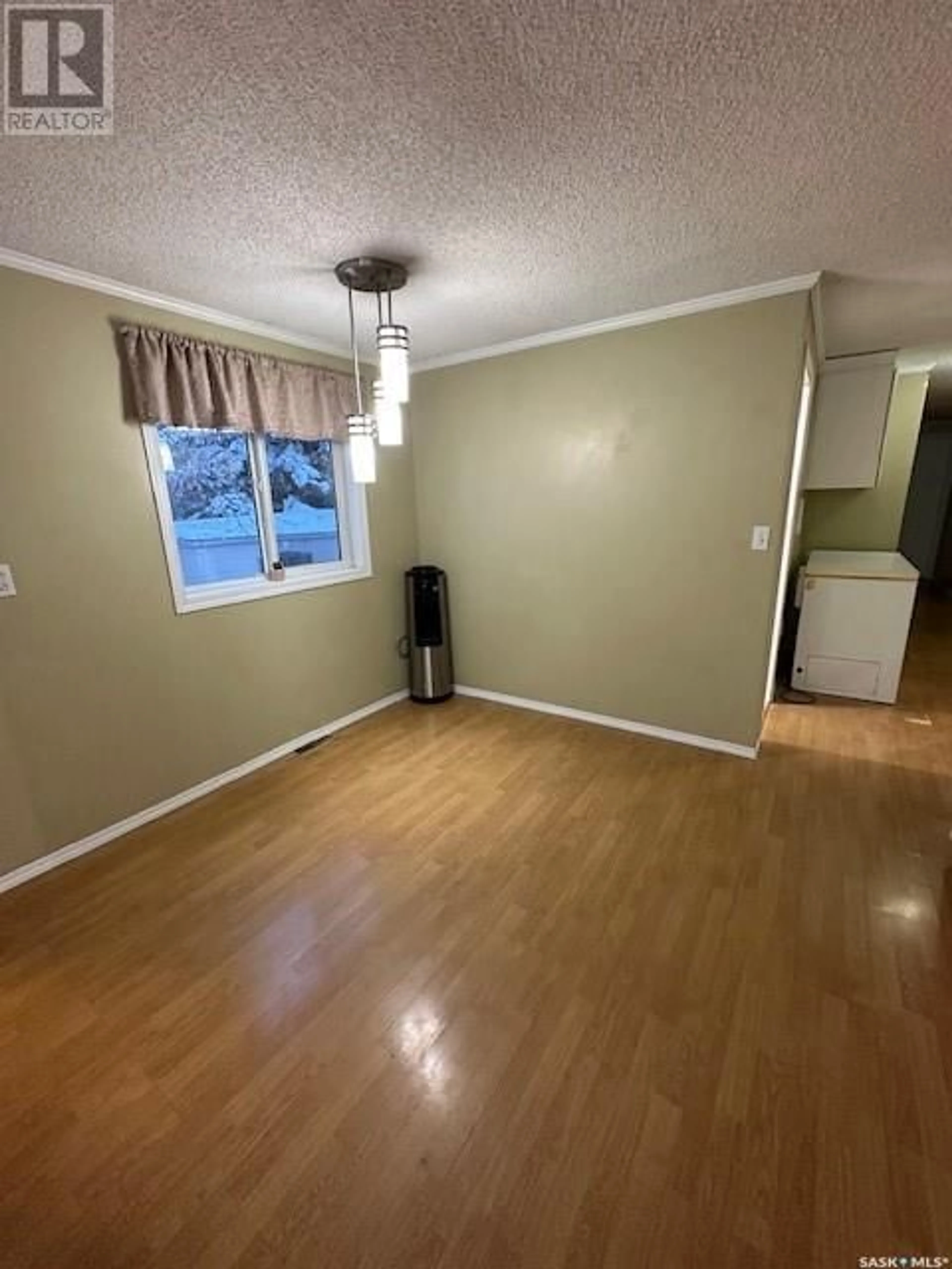 A pic of a room, wood floors for 330 2nd STREET, Mclean Saskatchewan S0G3E0