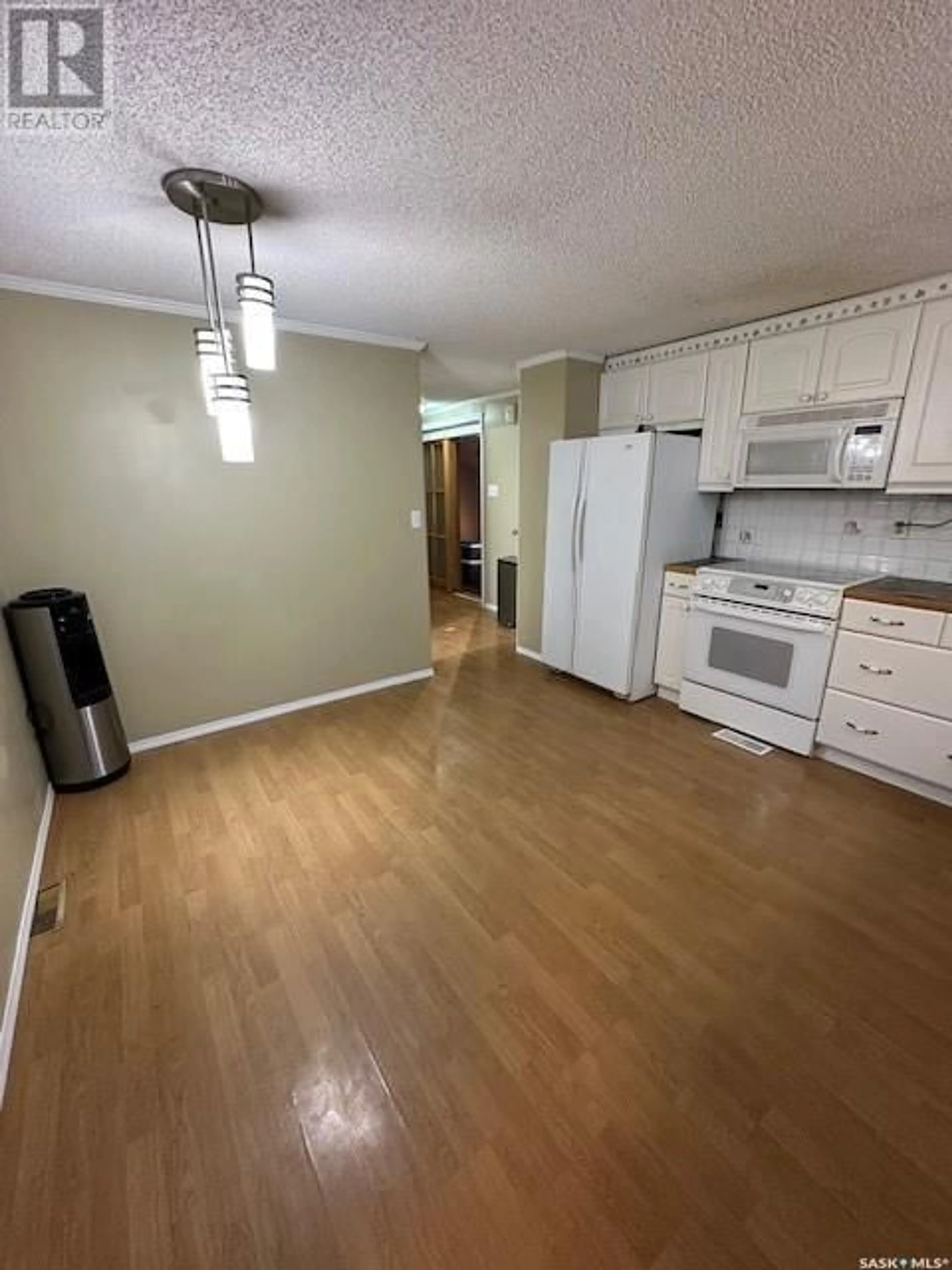 A pic of a room, wood floors for 330 2nd STREET, Mclean Saskatchewan S0G3E0