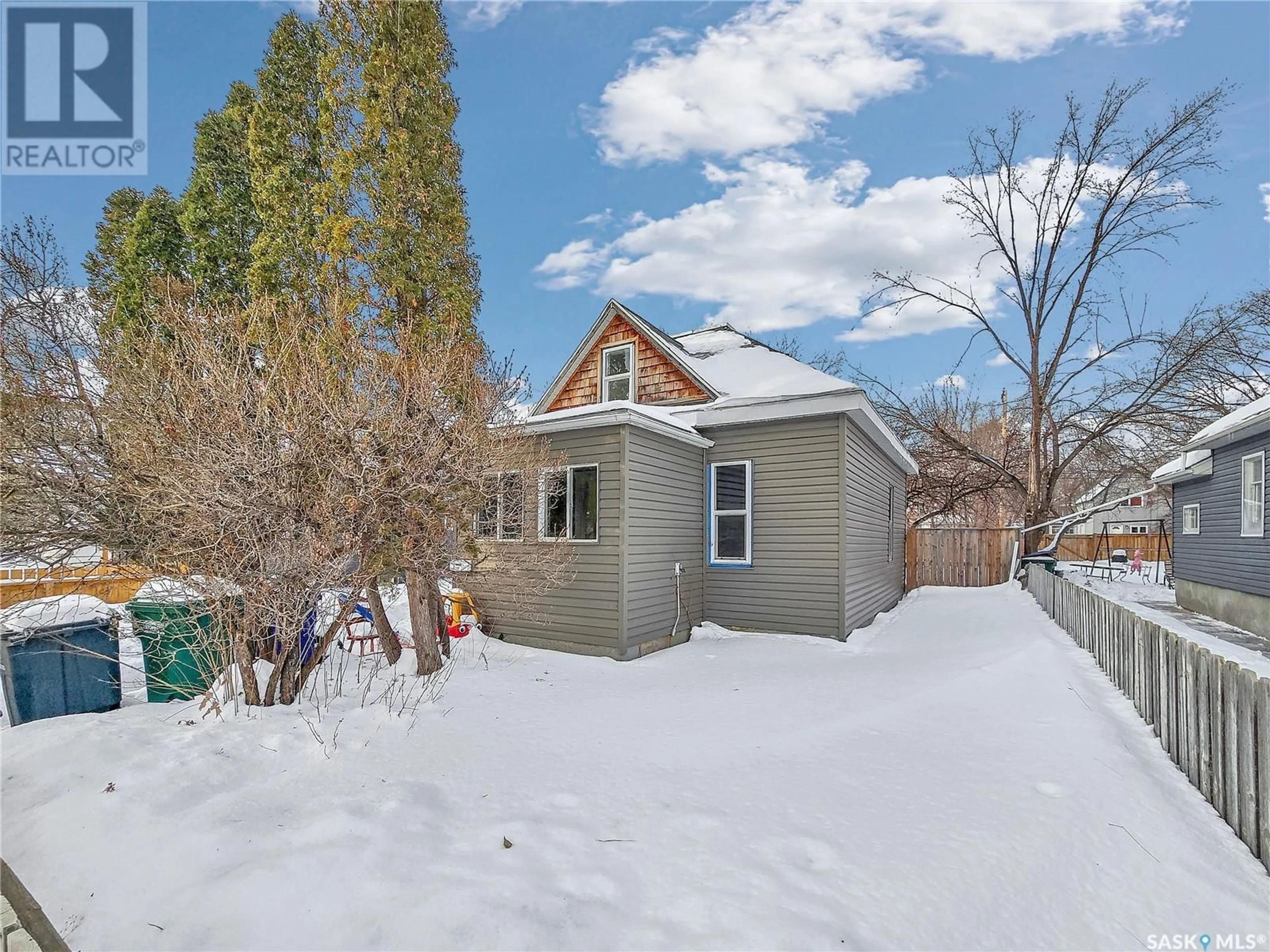 Frontside or backside of a home, the fenced backyard for 527 F AVENUE S, Saskatoon Saskatchewan S7M1T6