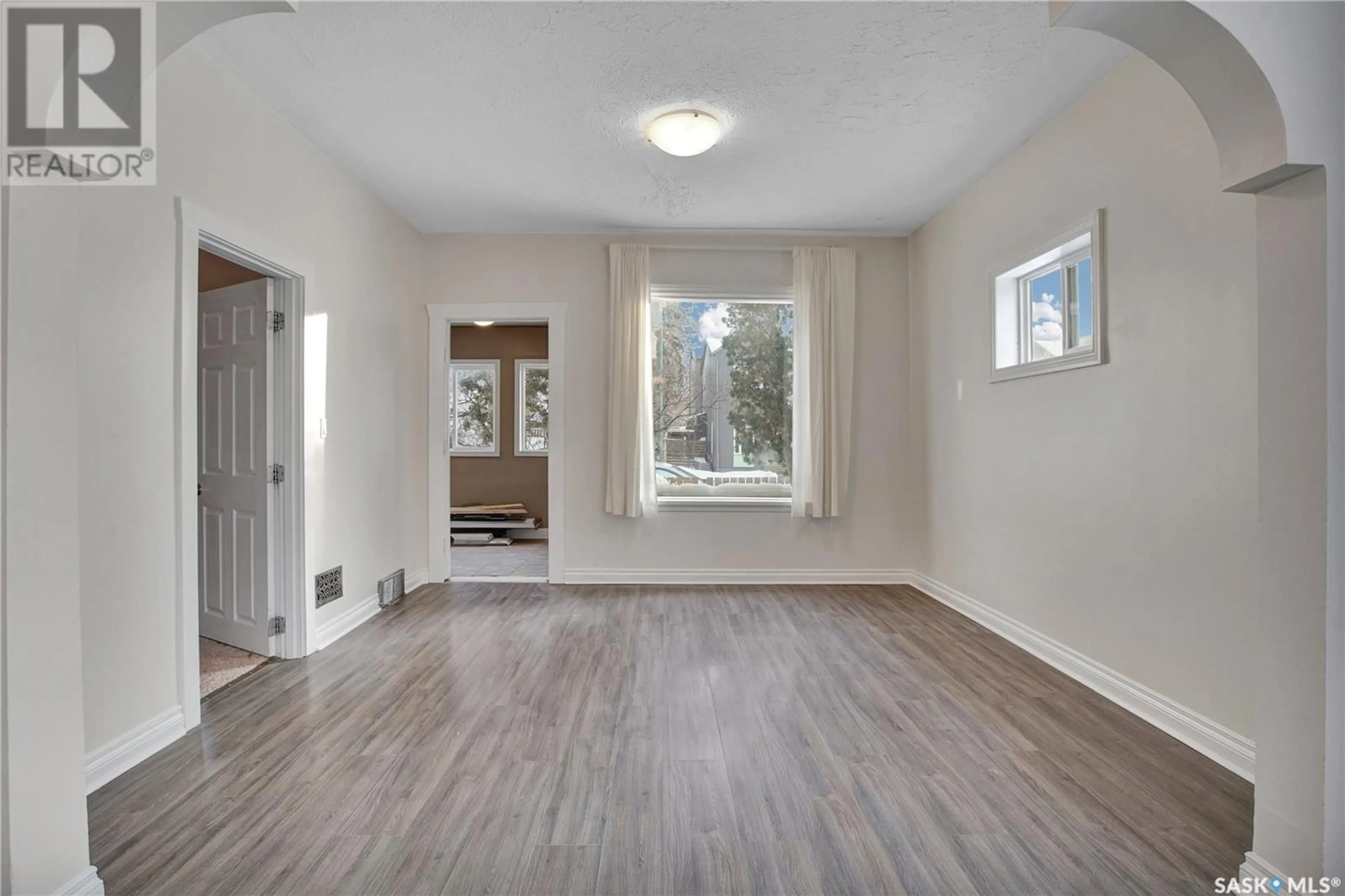 A pic of a room, wood floors for 527 F AVENUE S, Saskatoon Saskatchewan S7M1T6