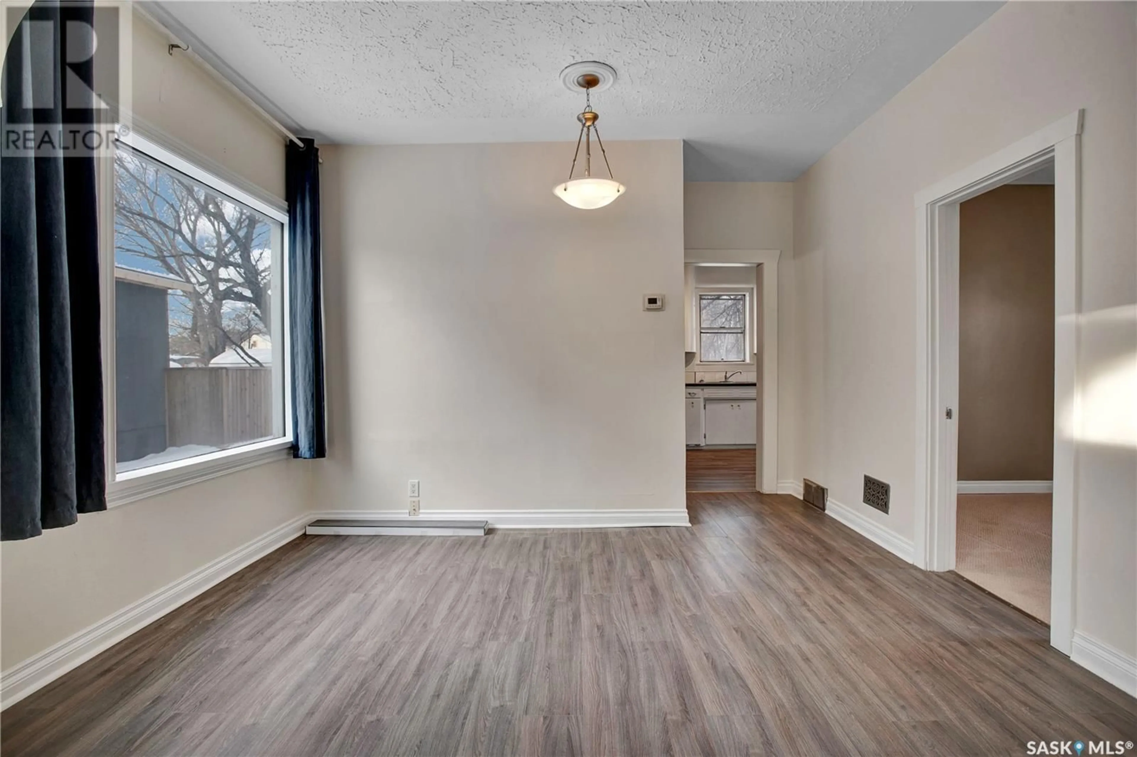 A pic of a room, wood floors for 527 F AVENUE S, Saskatoon Saskatchewan S7M1T6