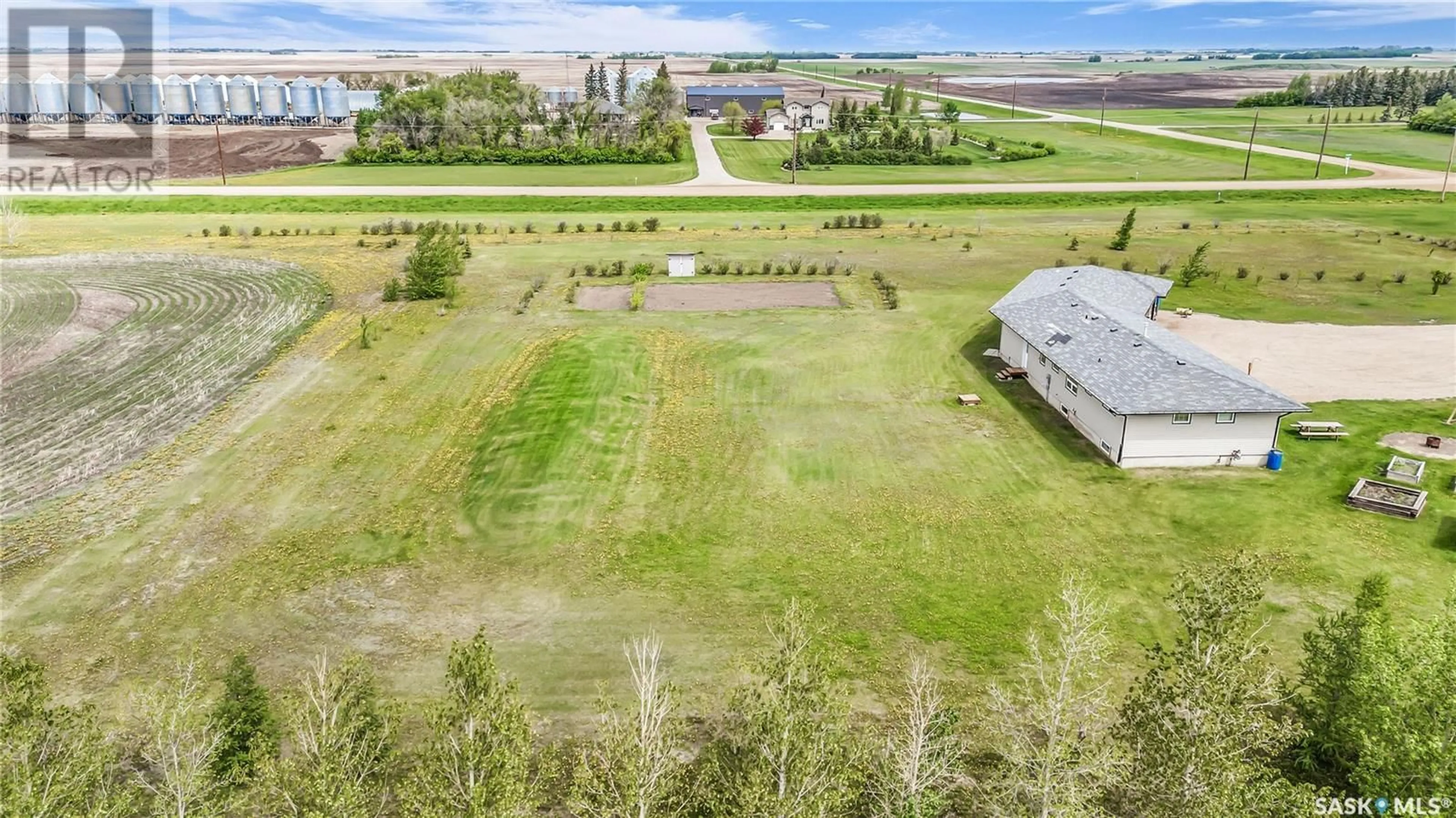 A pic from exterior of the house or condo, the fenced backyard for Williams Acreage, Laird Rm No. 404 Saskatchewan S0K1Z0