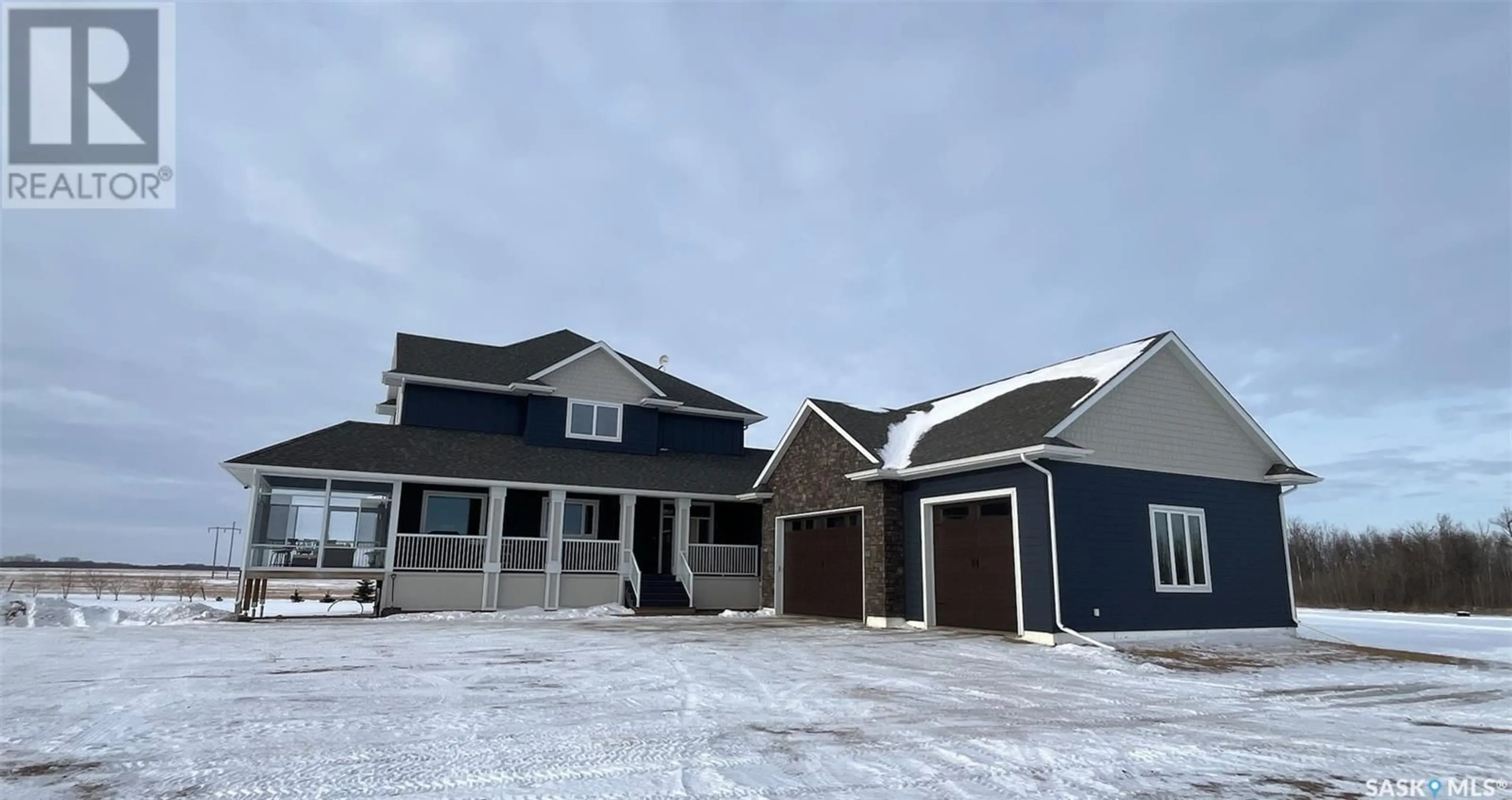 Frontside or backside of a home, the street view for Neudorf Acreage, Corman Park Rm No. 344 Saskatchewan S7K3J5