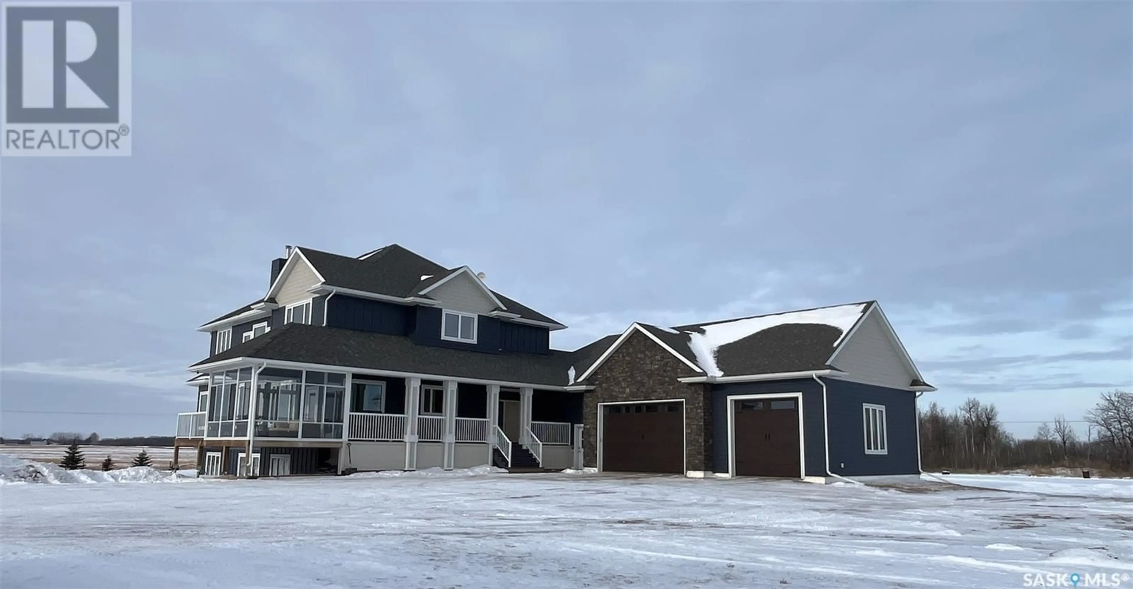 Frontside or backside of a home, the street view for Neudorf Acreage, Corman Park Rm No. 344 Saskatchewan S7K3J5