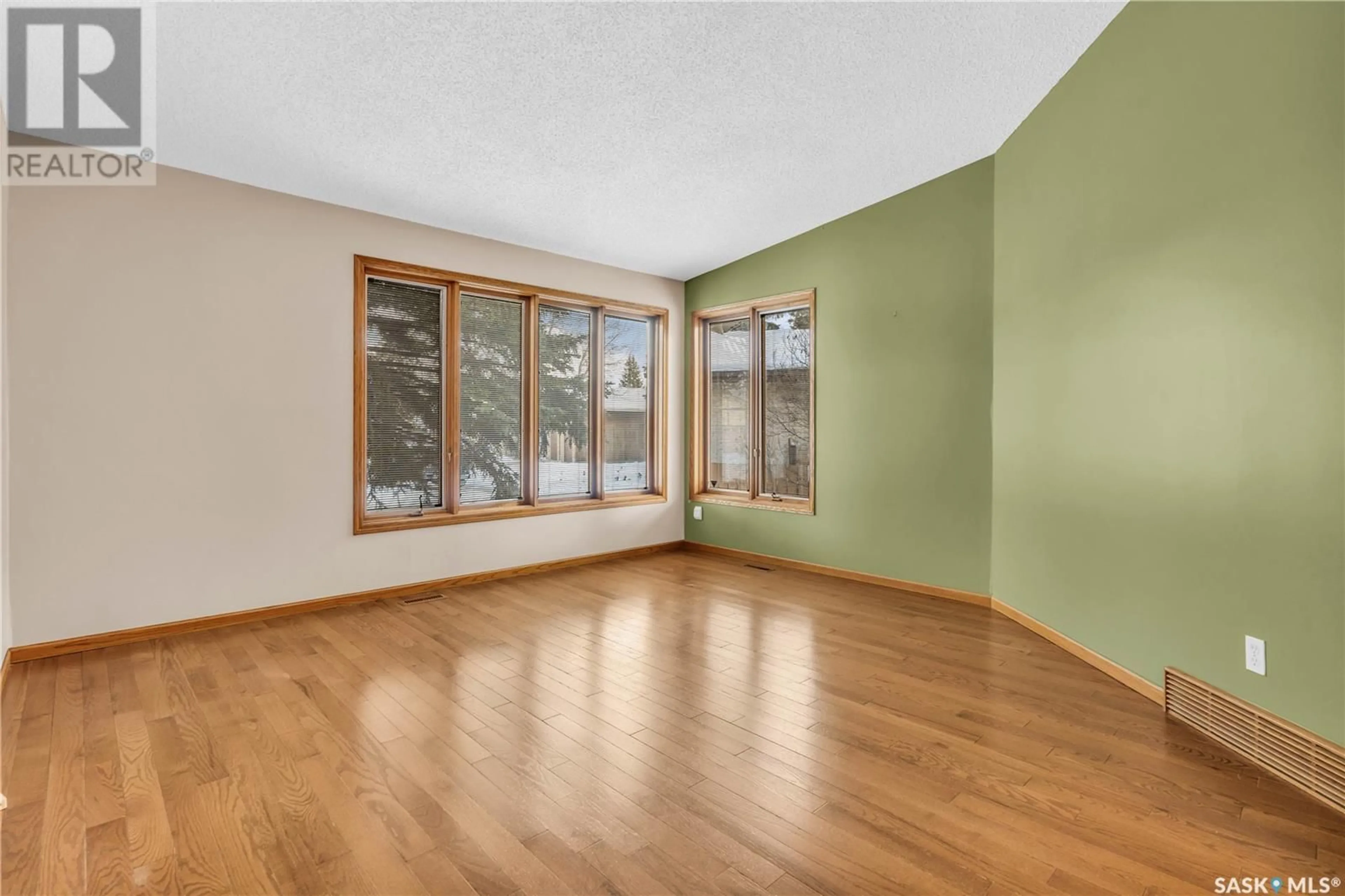 A pic of a room, wood floors for 2826 Audette BAY E, Regina Saskatchewan S4V1W9