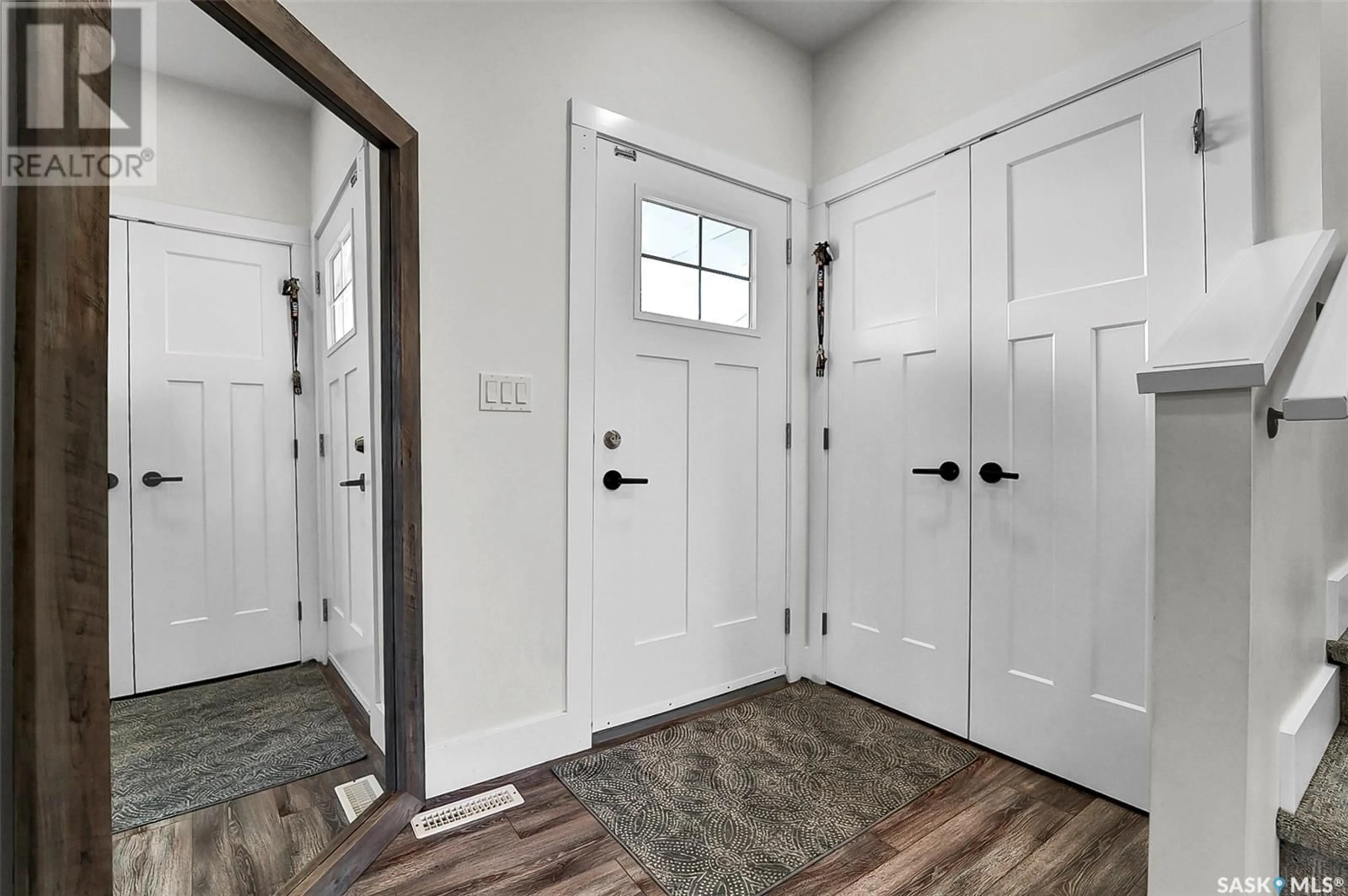 Indoor entryway, wood floors for 2019 Stilling LANE, Saskatoon Saskatchewan S7V0X1