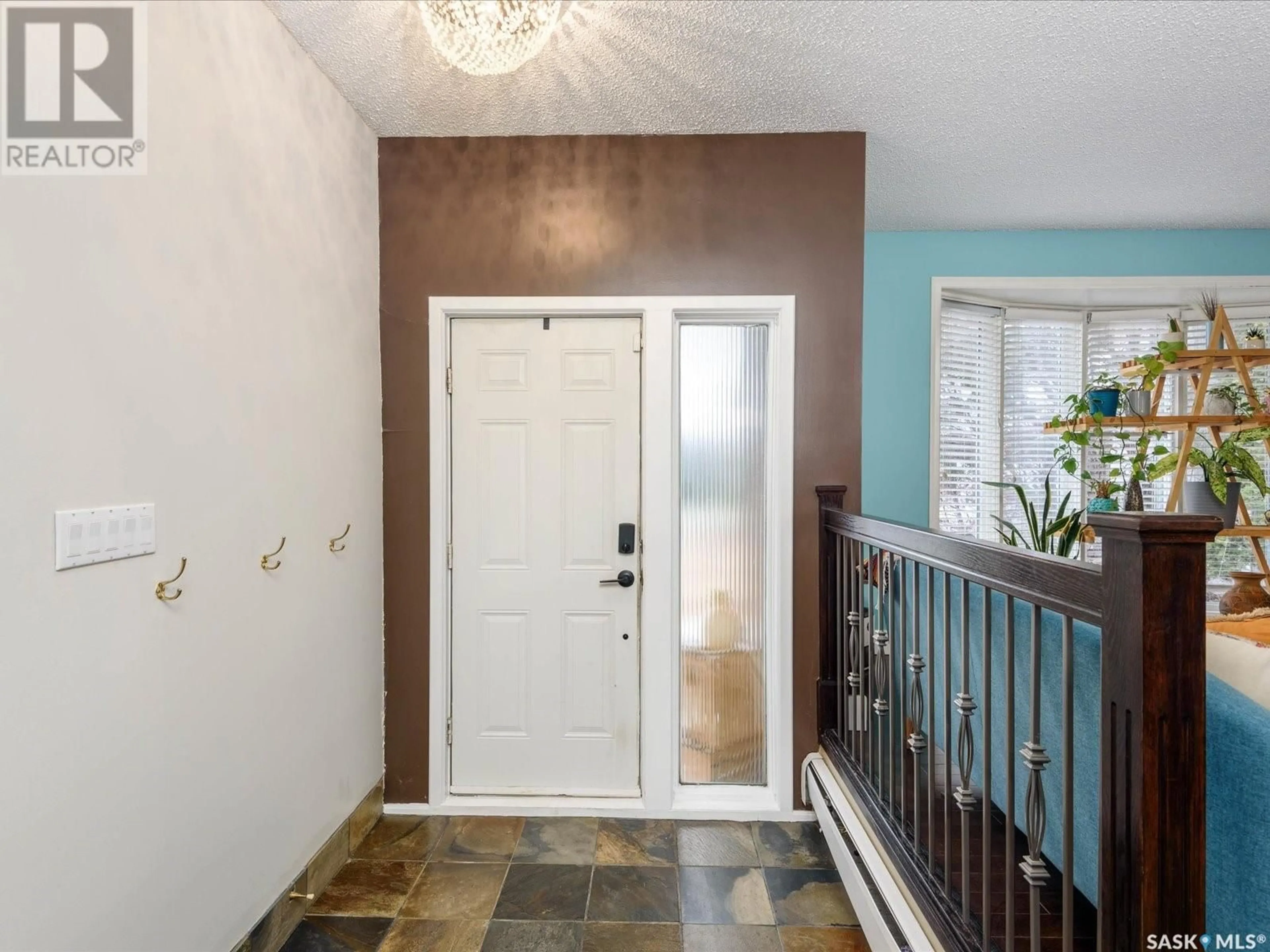 Indoor entryway, wood floors for 122 HAWKES BAY, Regina Saskatchewan S4X1C6