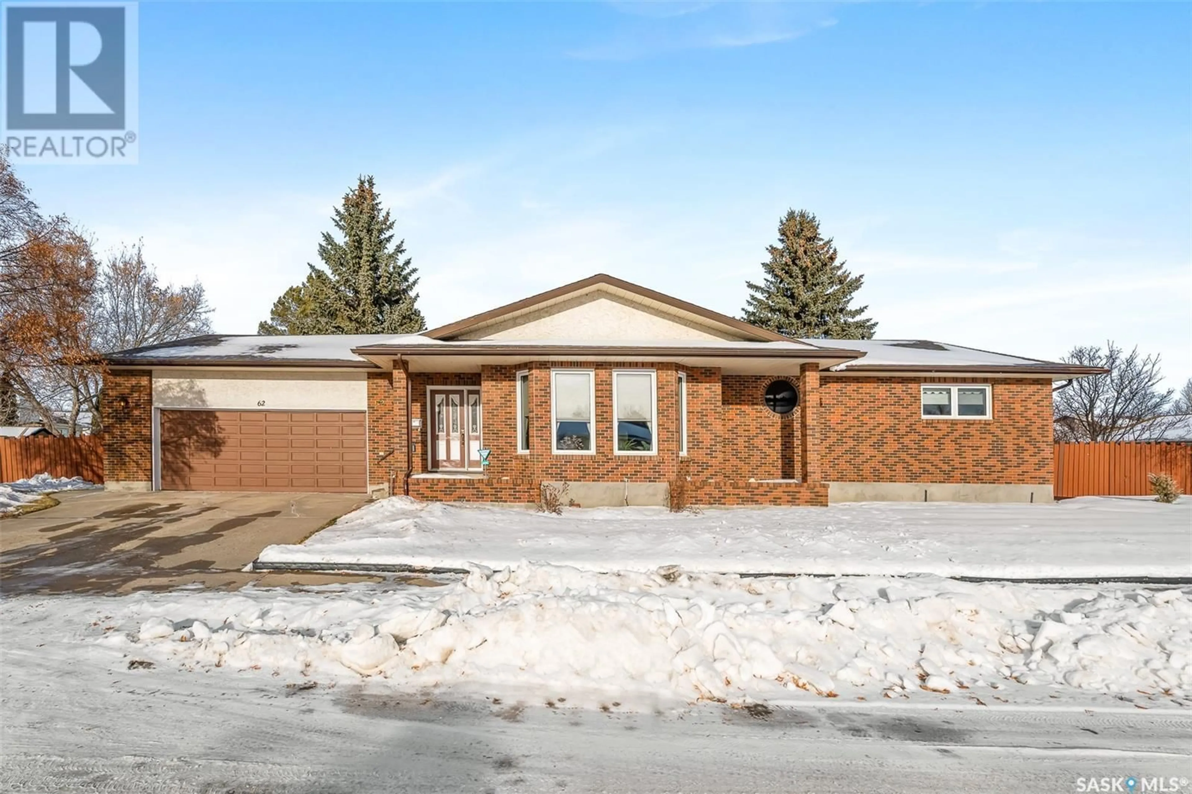 Home with brick exterior material for 62 Calypso DRIVE, Moose Jaw Saskatchewan S6J1G8