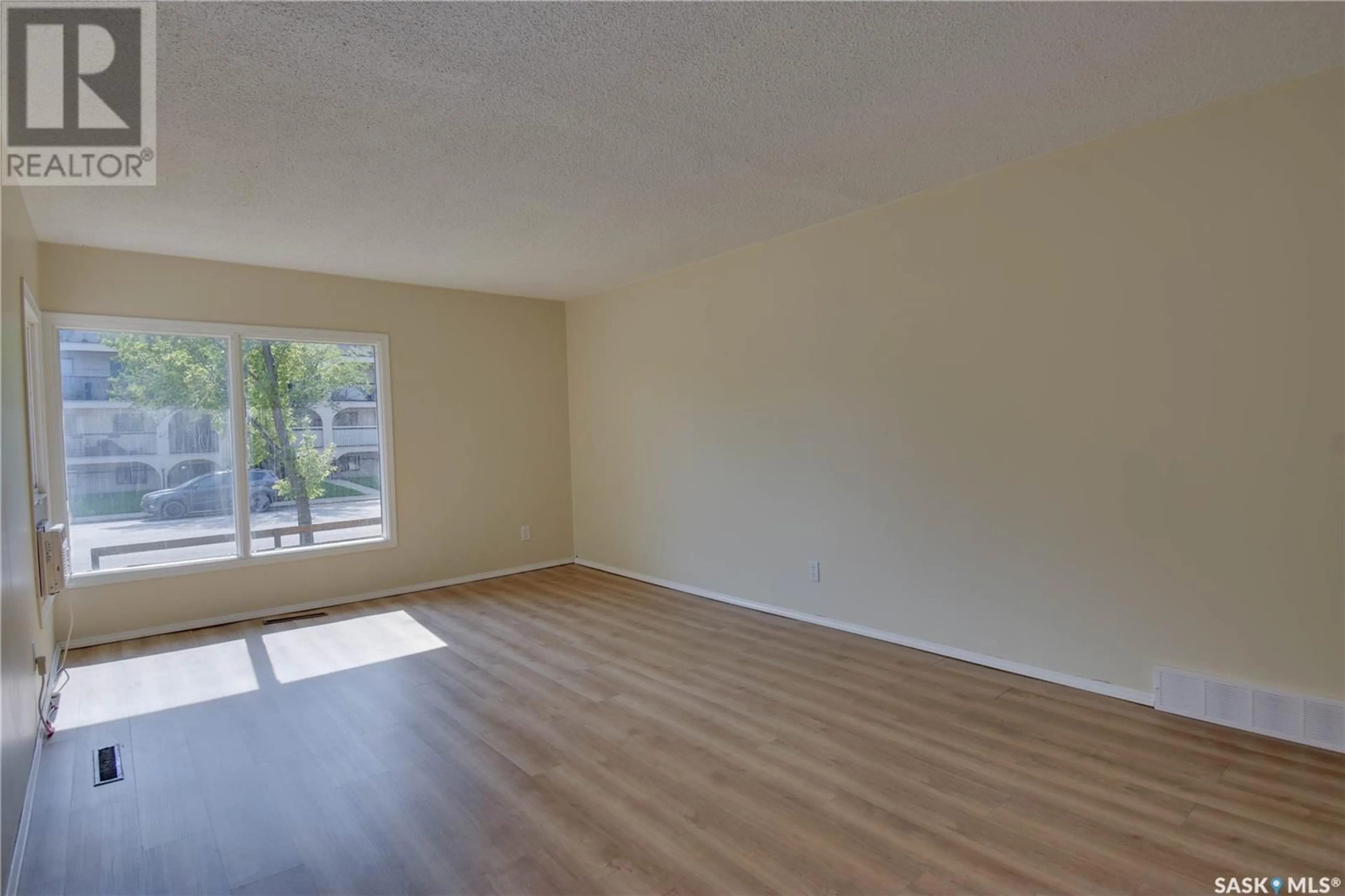 A pic of a room, wood floors for 601 Hilliard STREET W, Saskatoon Saskatchewan S7M0G3