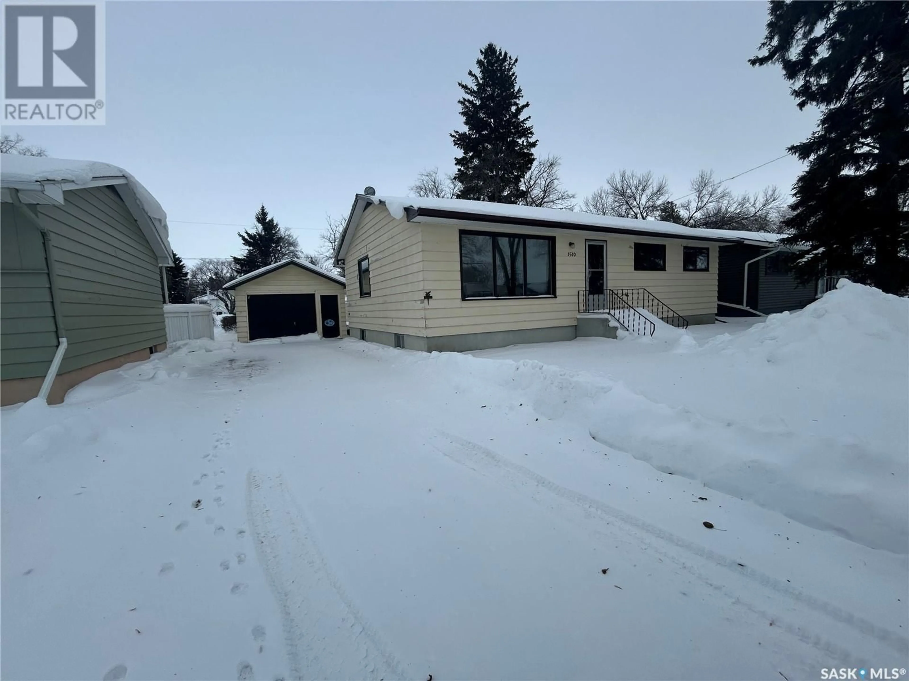 Frontside or backside of a home, the street view for 1510 97th STREET, Tisdale Saskatchewan S0E1T0