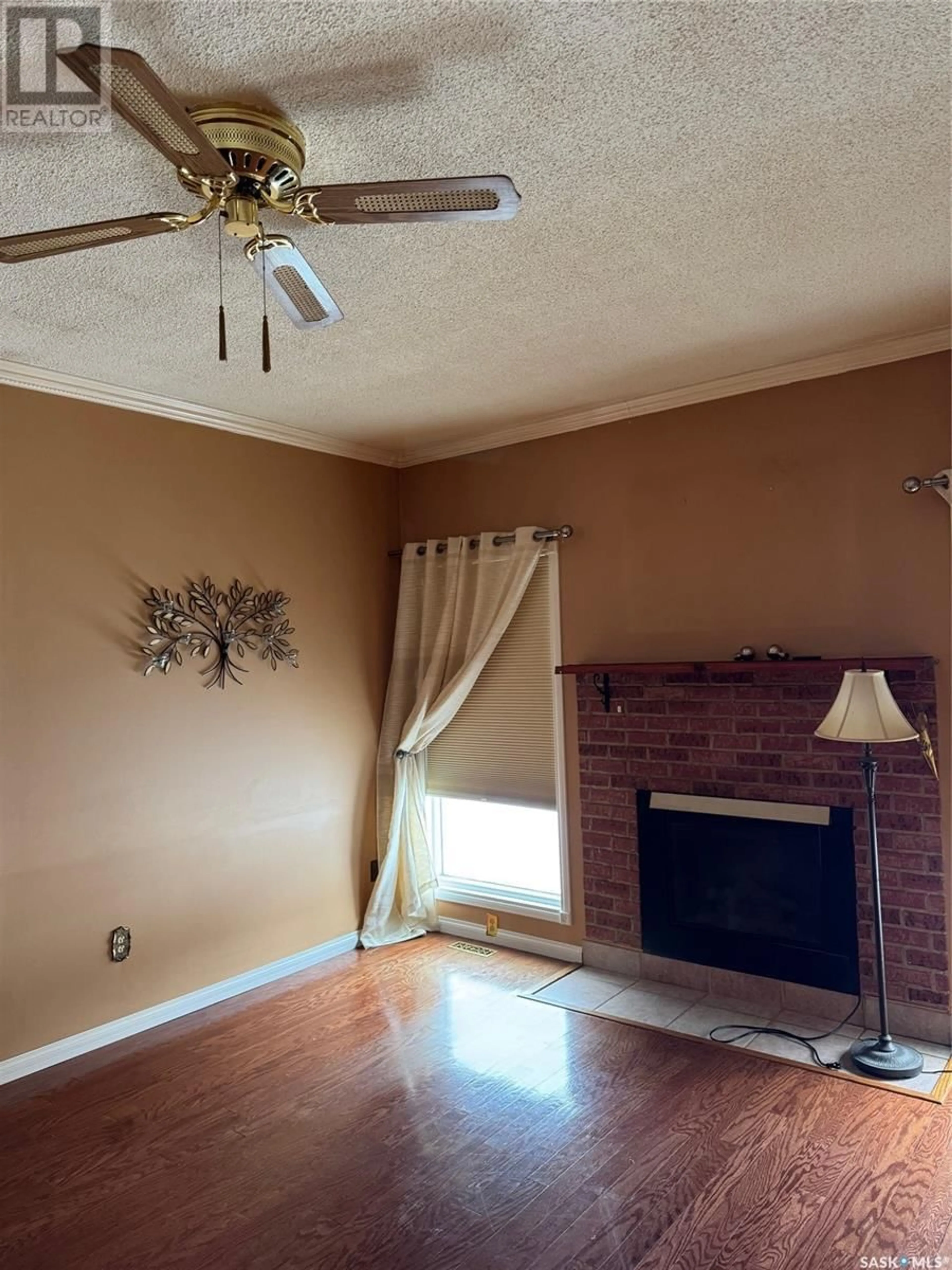 A pic of a room, wood floors for 1072 111th STREET, North Battleford Saskatchewan S9A3S9