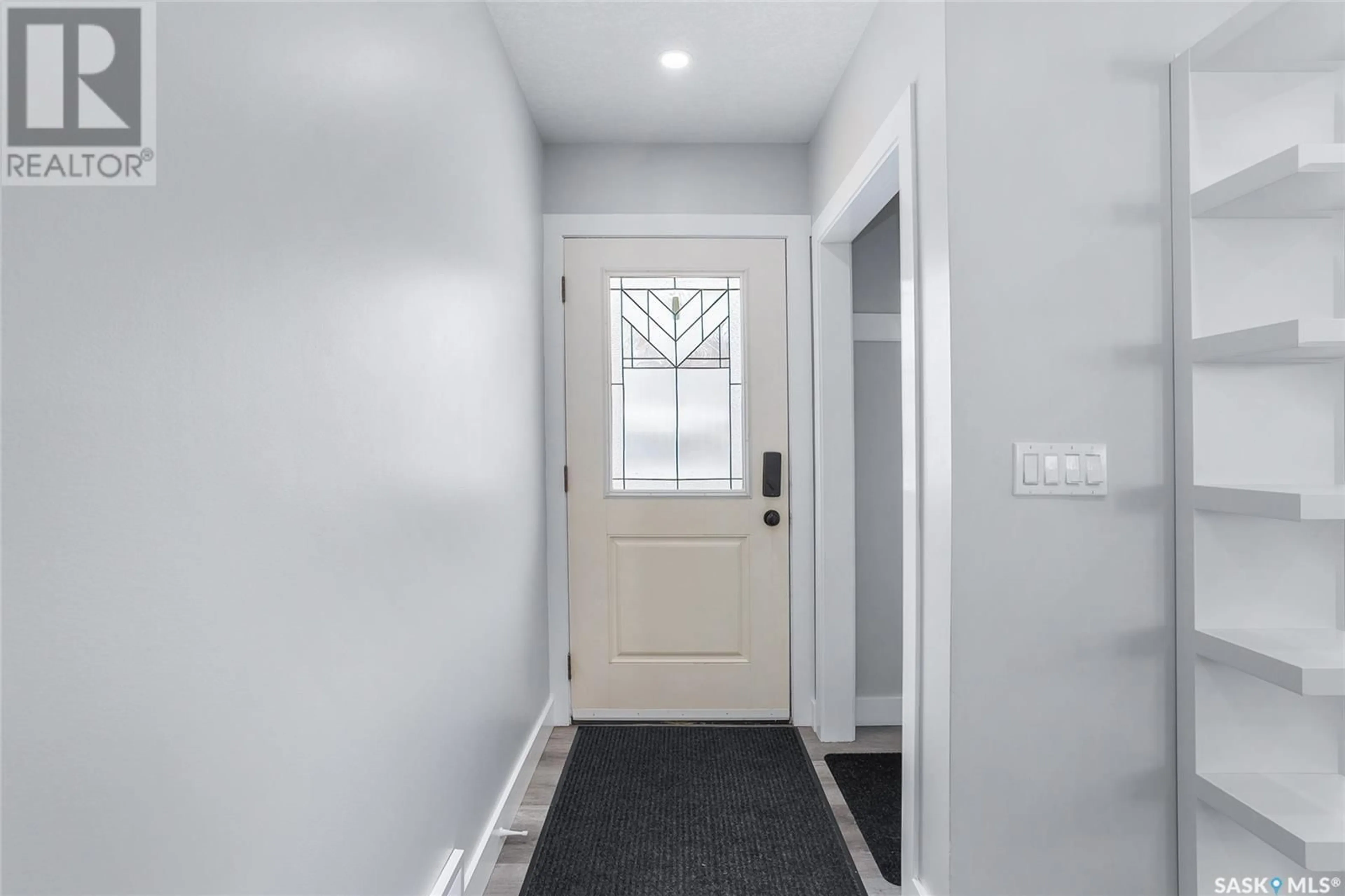 Indoor entryway, wood floors for 2417 Clarence AVENUE S, Saskatoon Saskatchewan S7J3L8