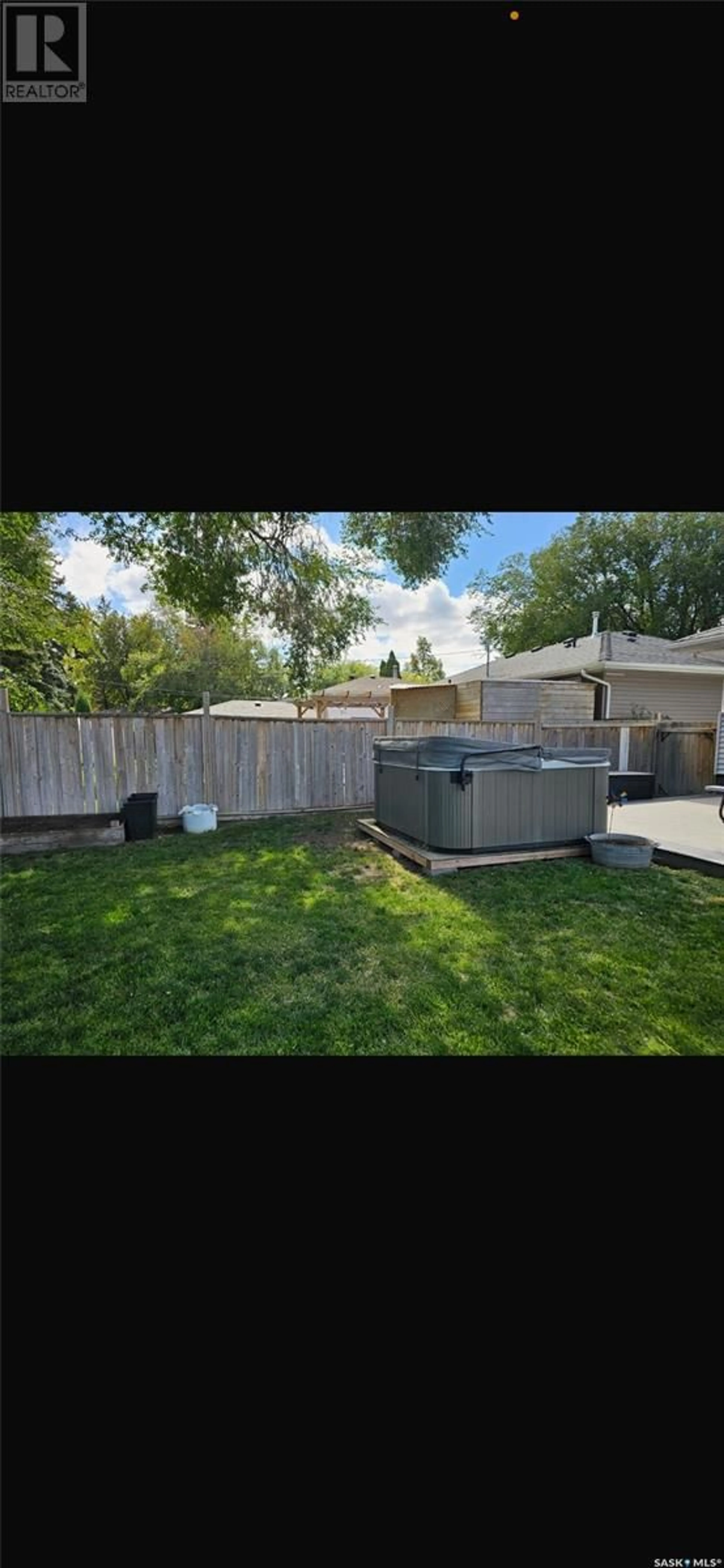 A pic from outside/outdoor area/front of a property/back of a property/a pic from drone, street for 2417 Clarence AVENUE S, Saskatoon Saskatchewan S7J1M1