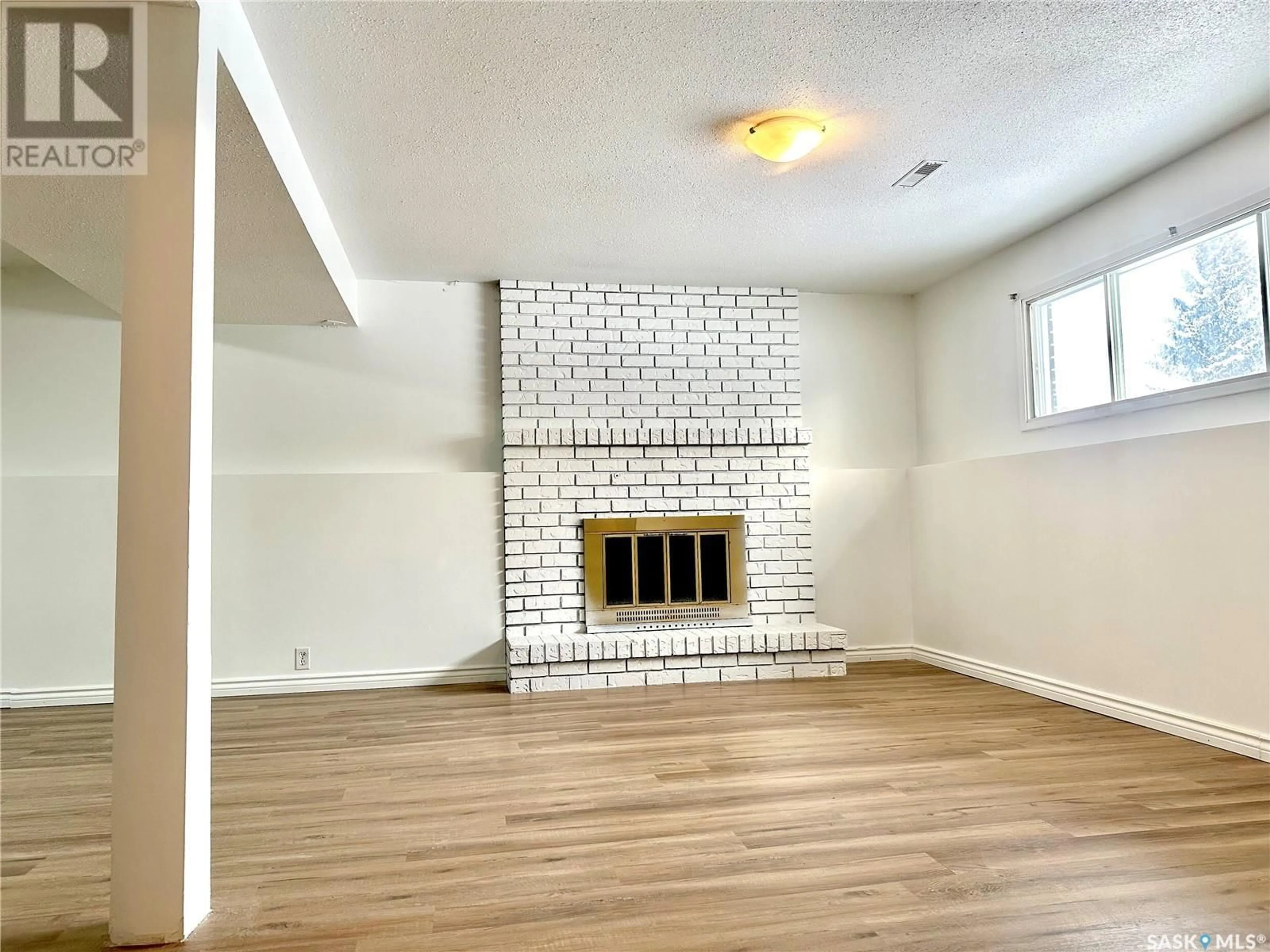 A pic of a room, wood floors for 638 REDBERRY ROAD, Saskatoon Saskatchewan S7K4S5