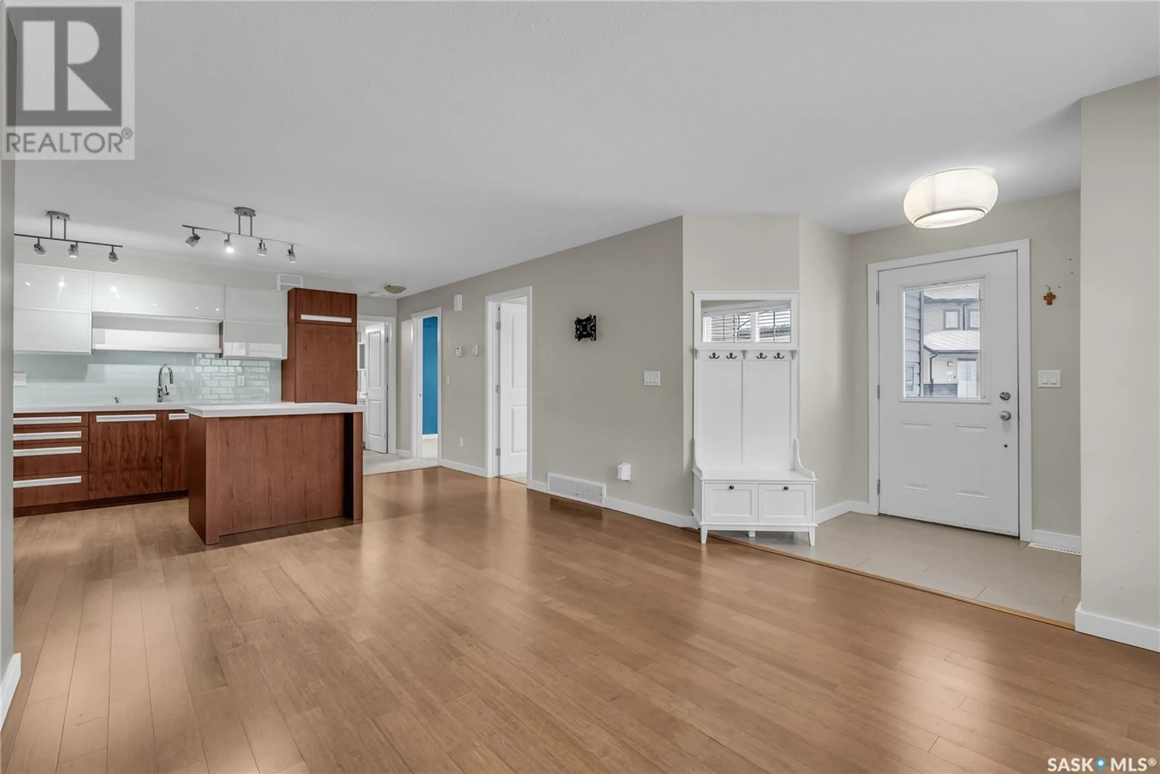 A pic of a room, wood floors for 1803 1015 Patrick CRESCENT, Saskatoon Saskatchewan S7W0M6