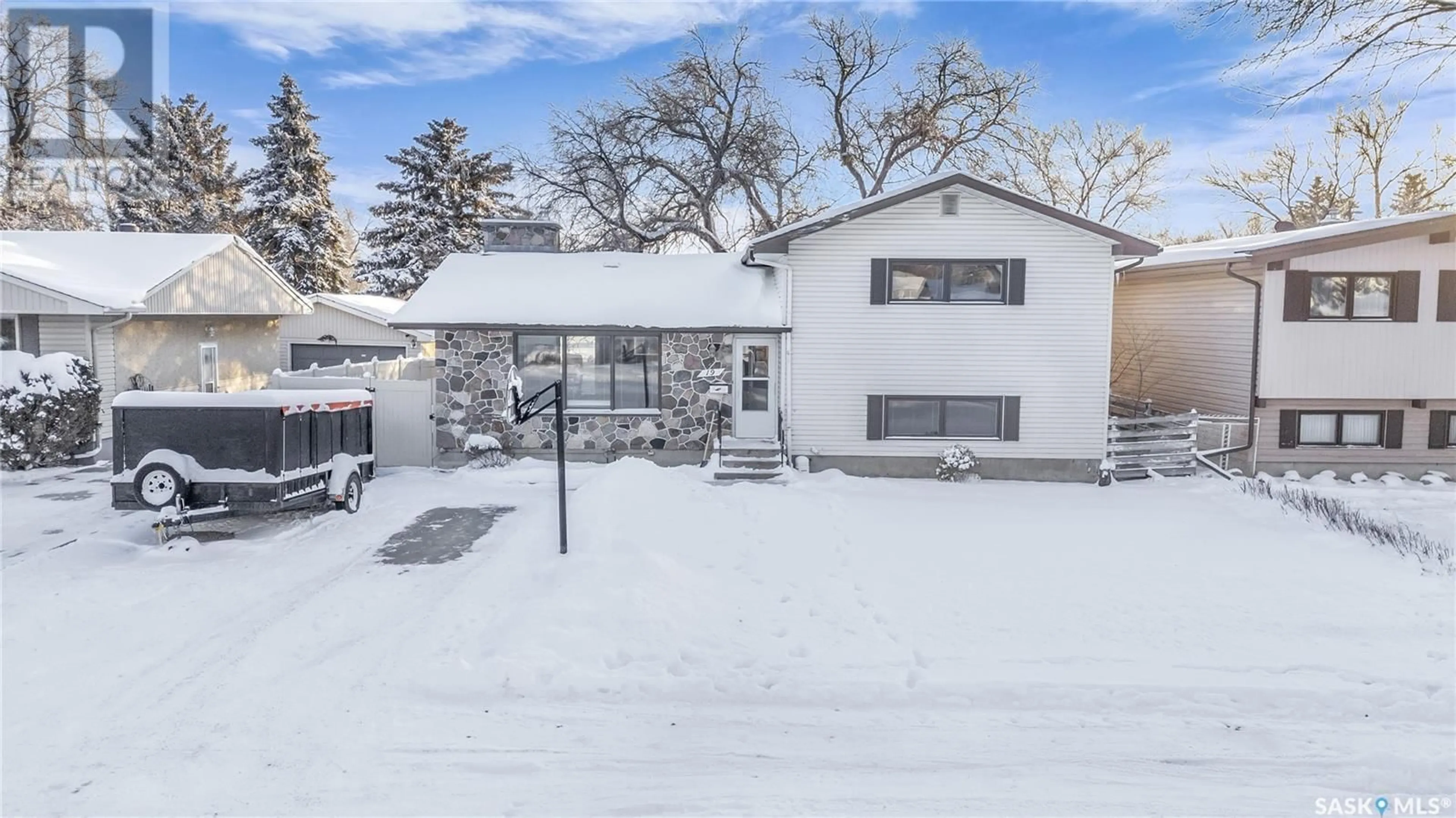 A pic from exterior of the house or condo, the fenced backyard for 19 Matheson CRESCENT, Regina Saskatchewan S4R5C3