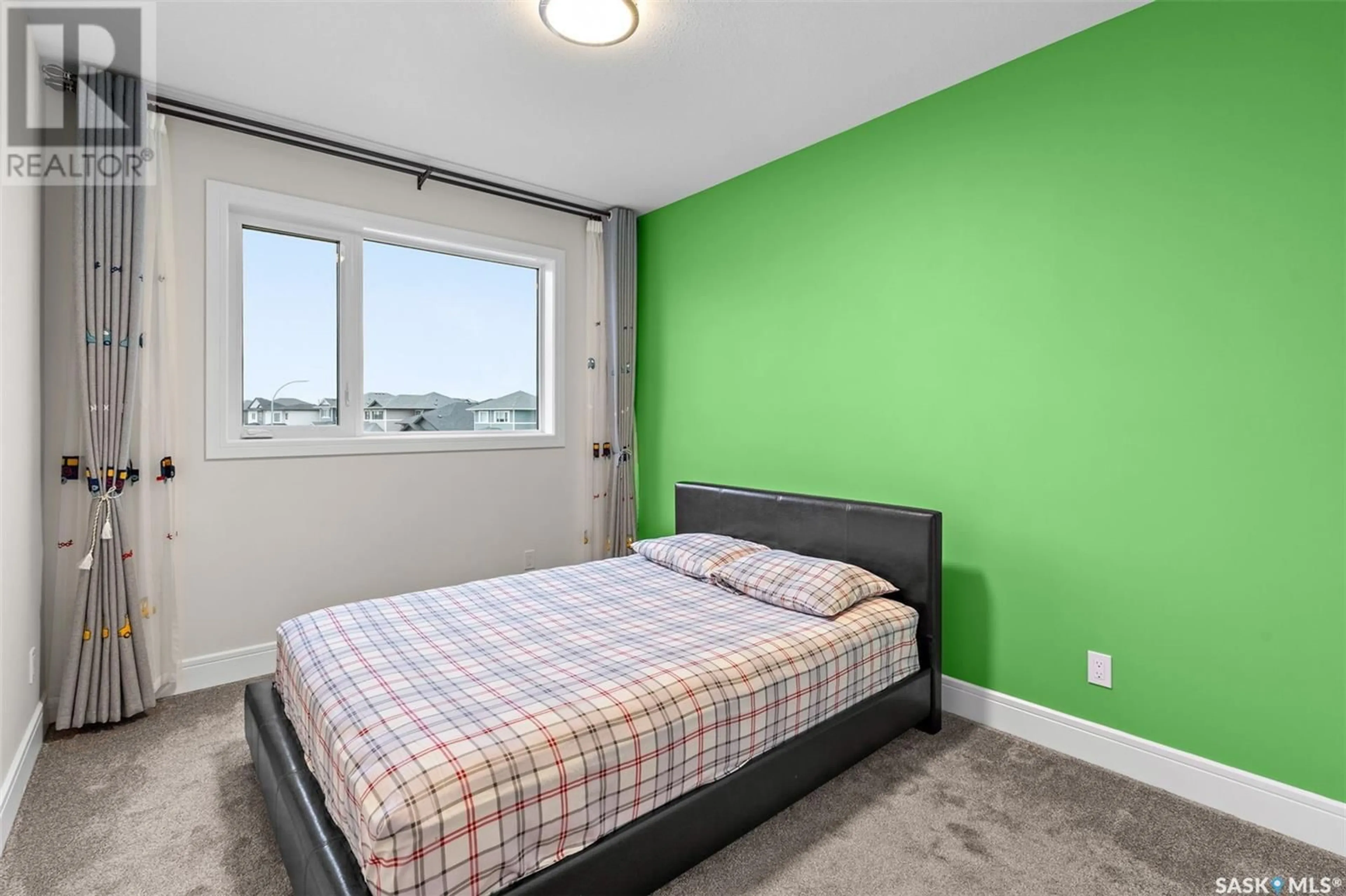 Bedroom with bed, unknown for 407 Kenaschuk CRESCENT, Saskatoon Saskatchewan S7W0Y3