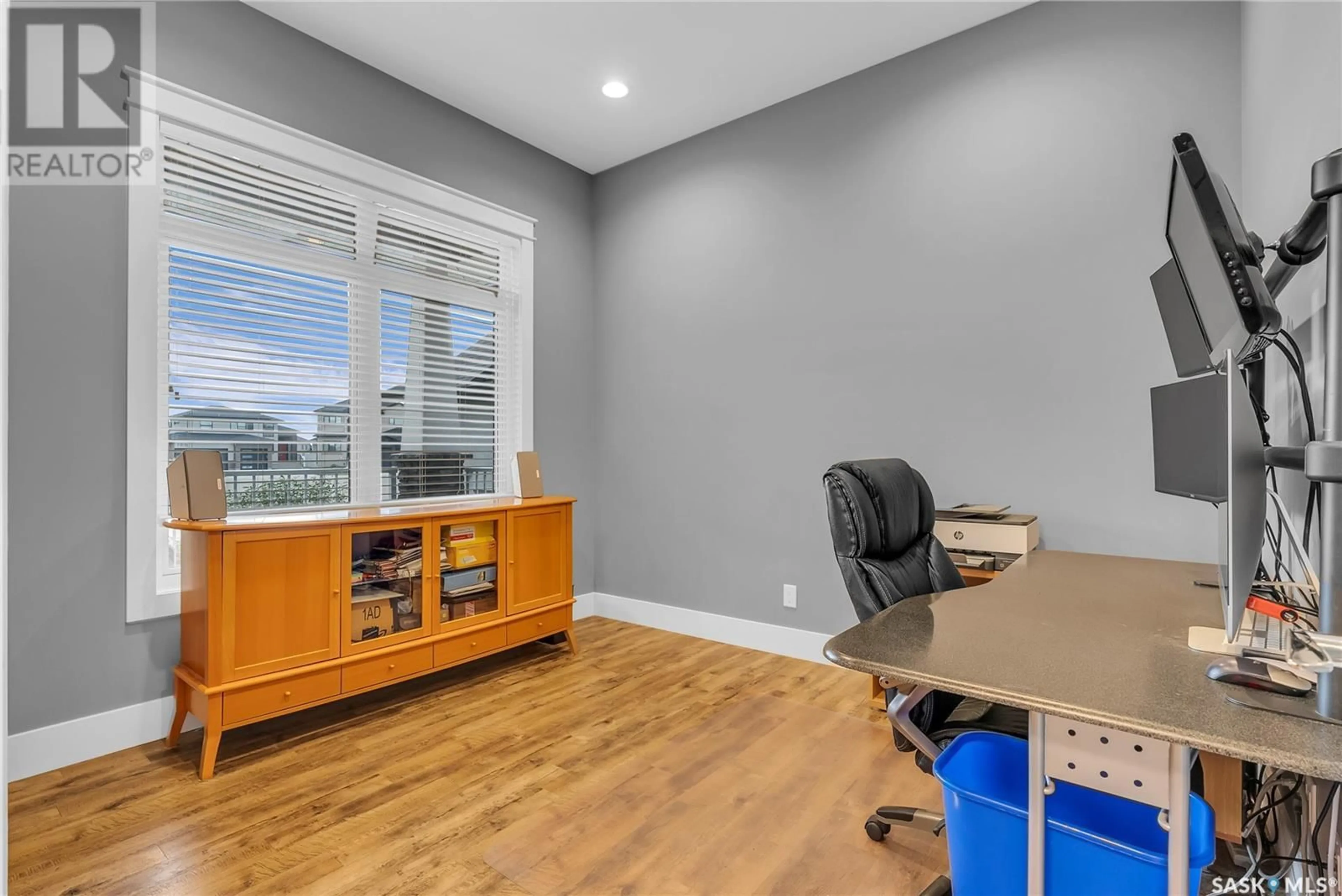 A pic of a room, wood floors for 142 Gillies LANE, Saskatoon Saskatchewan S7V0J8