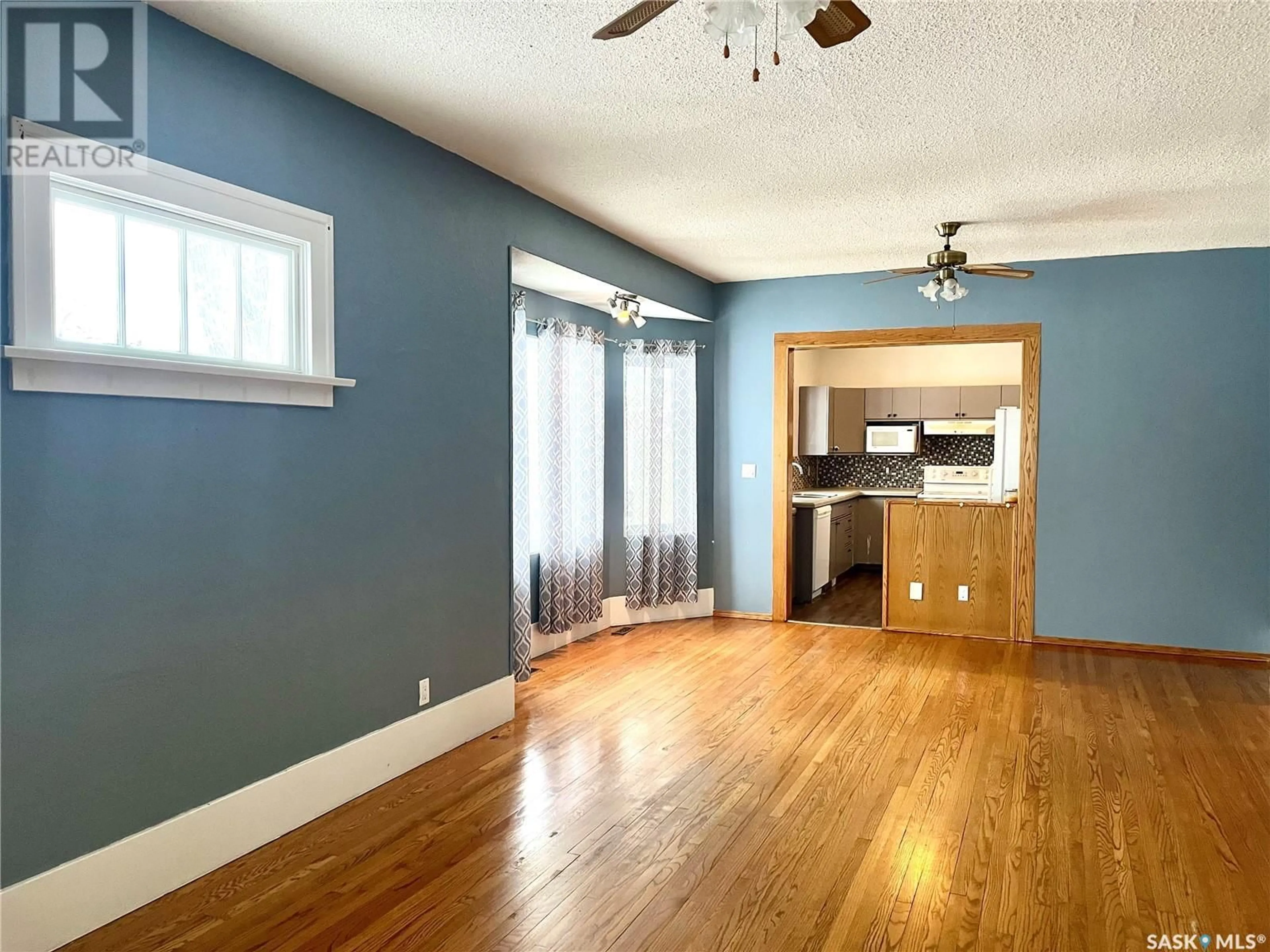 A pic of a room, wood floors for 394 2nd STREET W, Shaunavon Saskatchewan S0N2M0