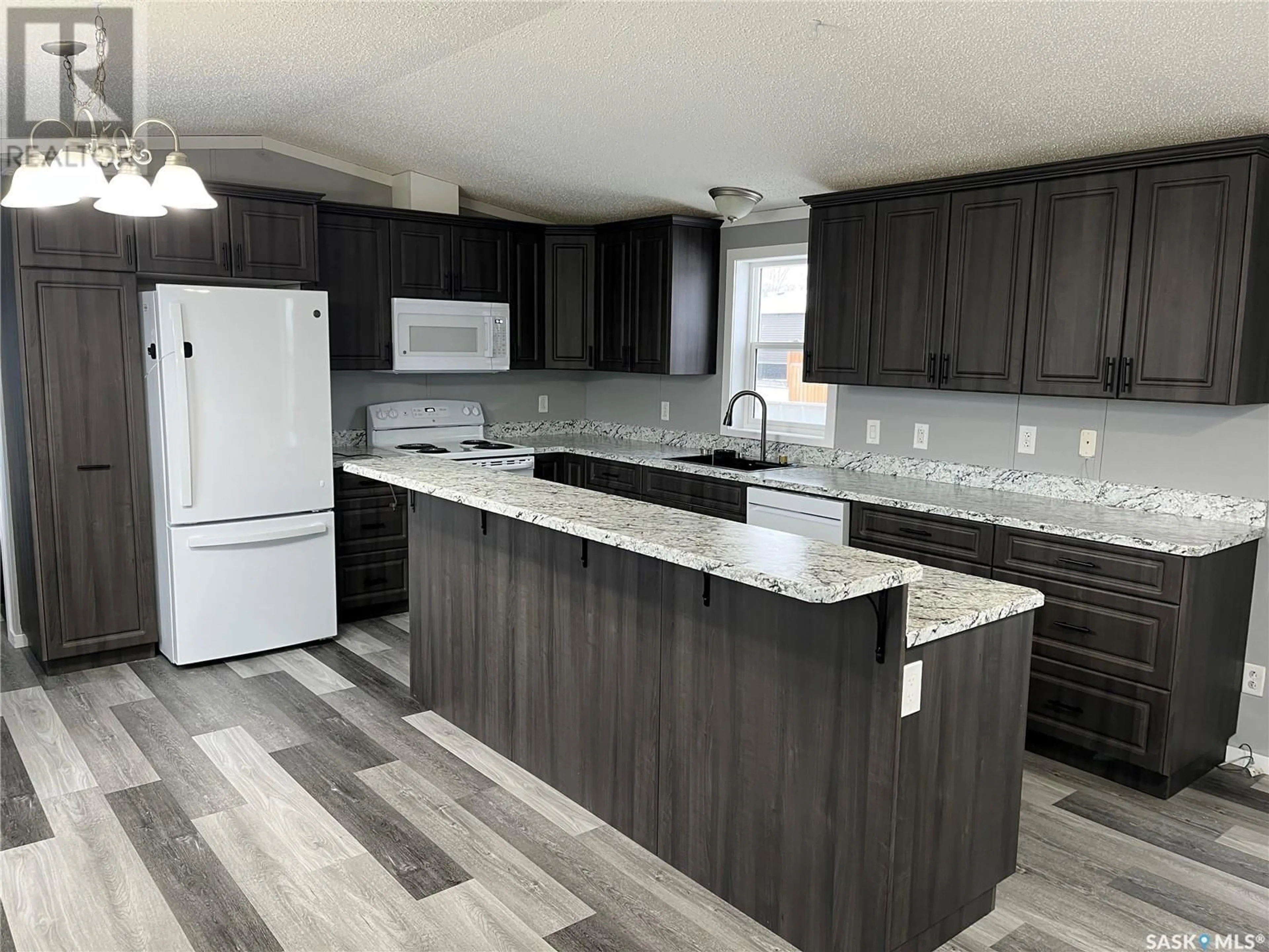 Open concept kitchen for 341 10th AVENUE S, Weyburn Saskatchewan S4H2R8