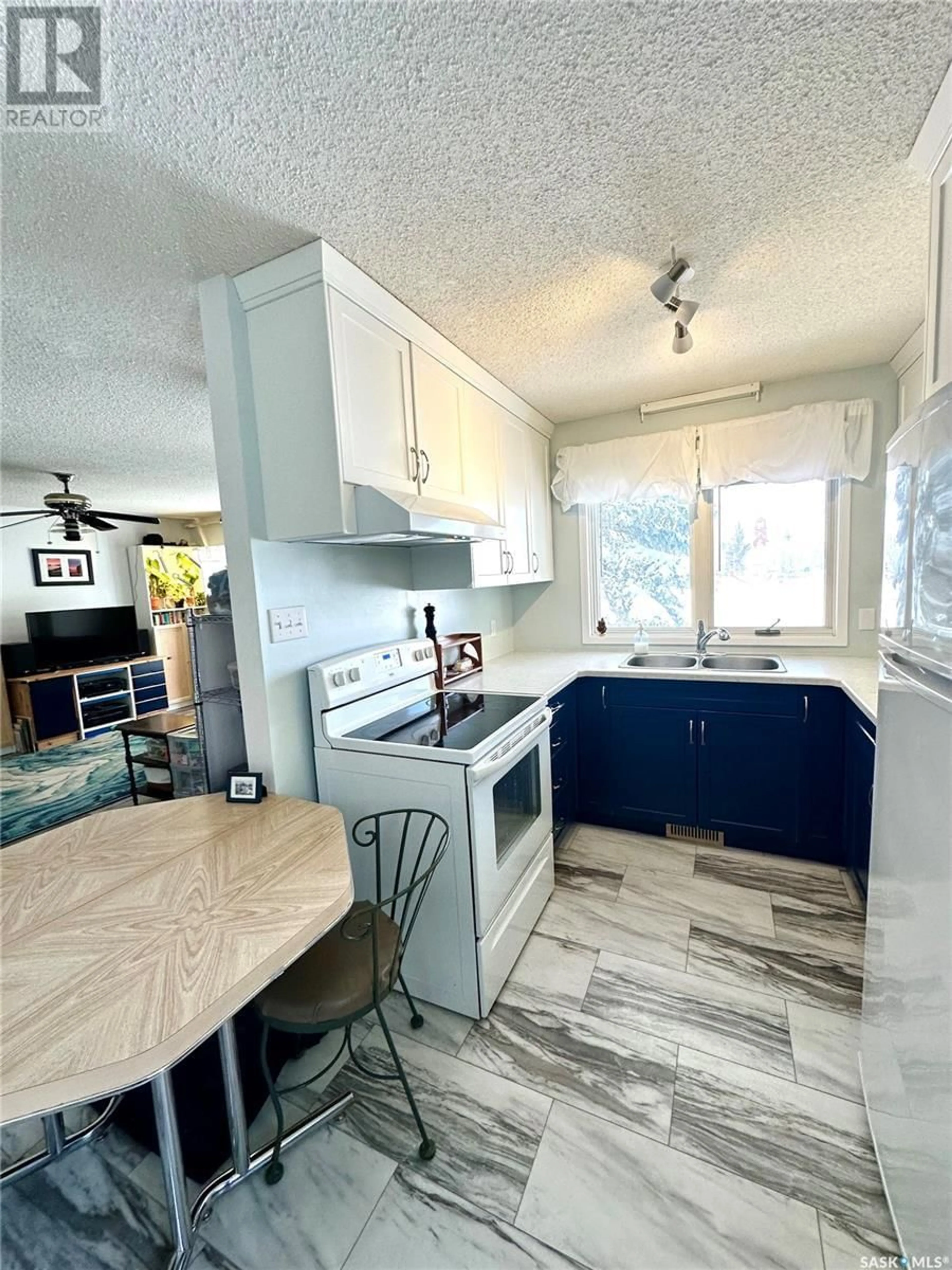 Open concept kitchen for 205 1st STREET W, Spiritwood Saskatchewan S0J2M0