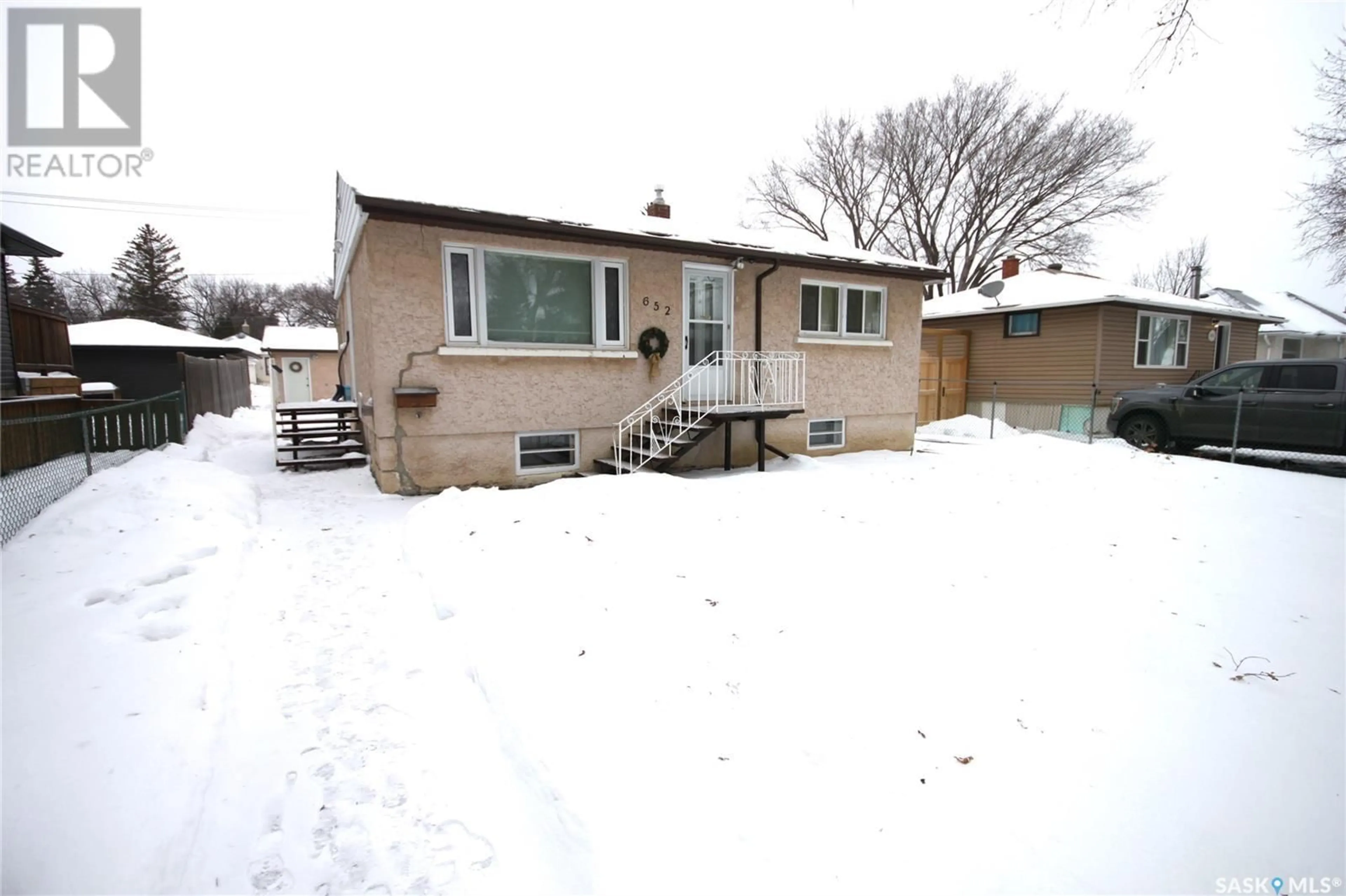 A pic from exterior of the house or condo, the fenced backyard for 652 Princess STREET, Regina Saskatchewan S4T3X5