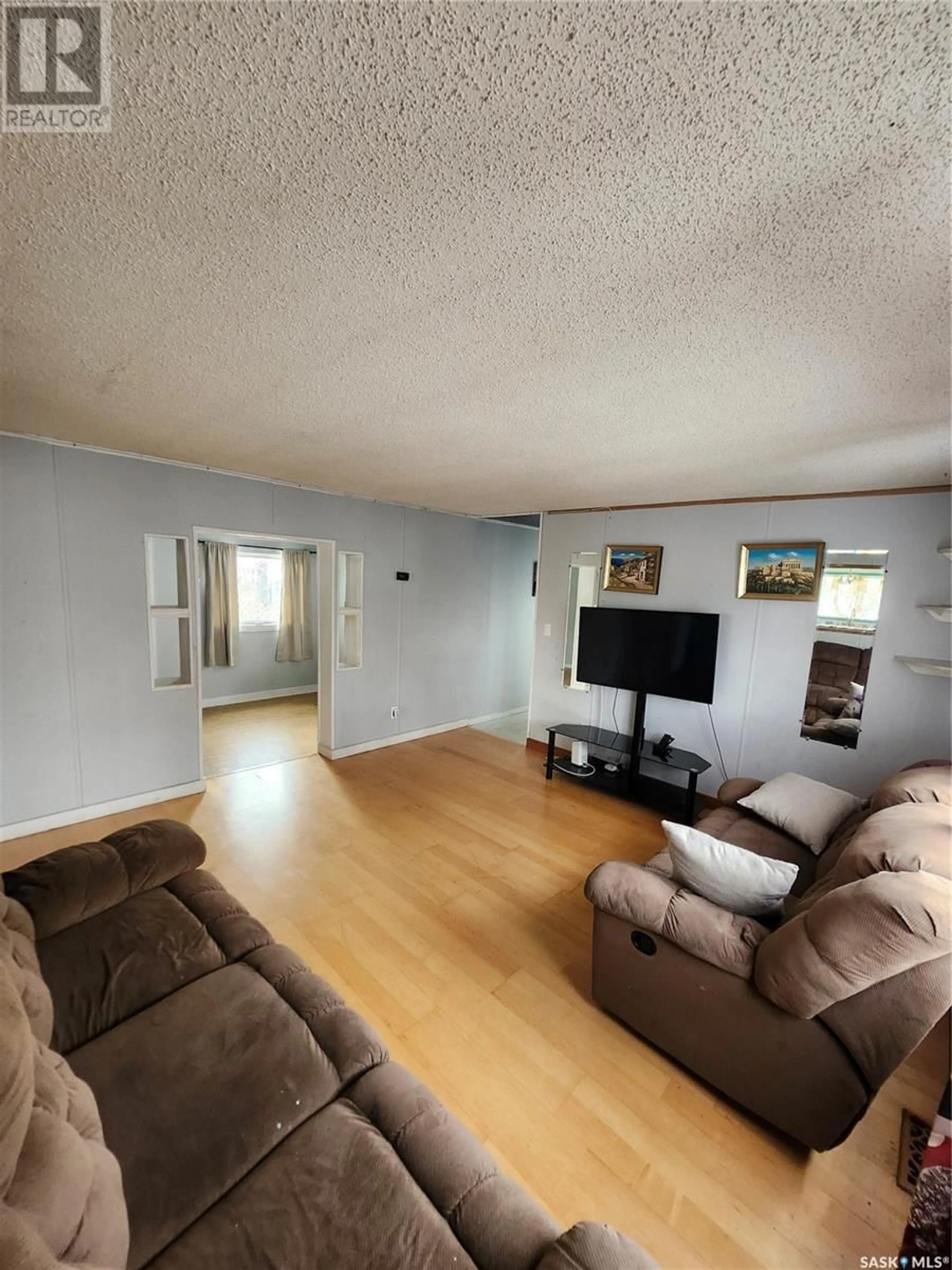 A pic of a room, wood floors for 102 1524 Rayner AVENUE, Saskatoon Saskatchewan S7N1Y1