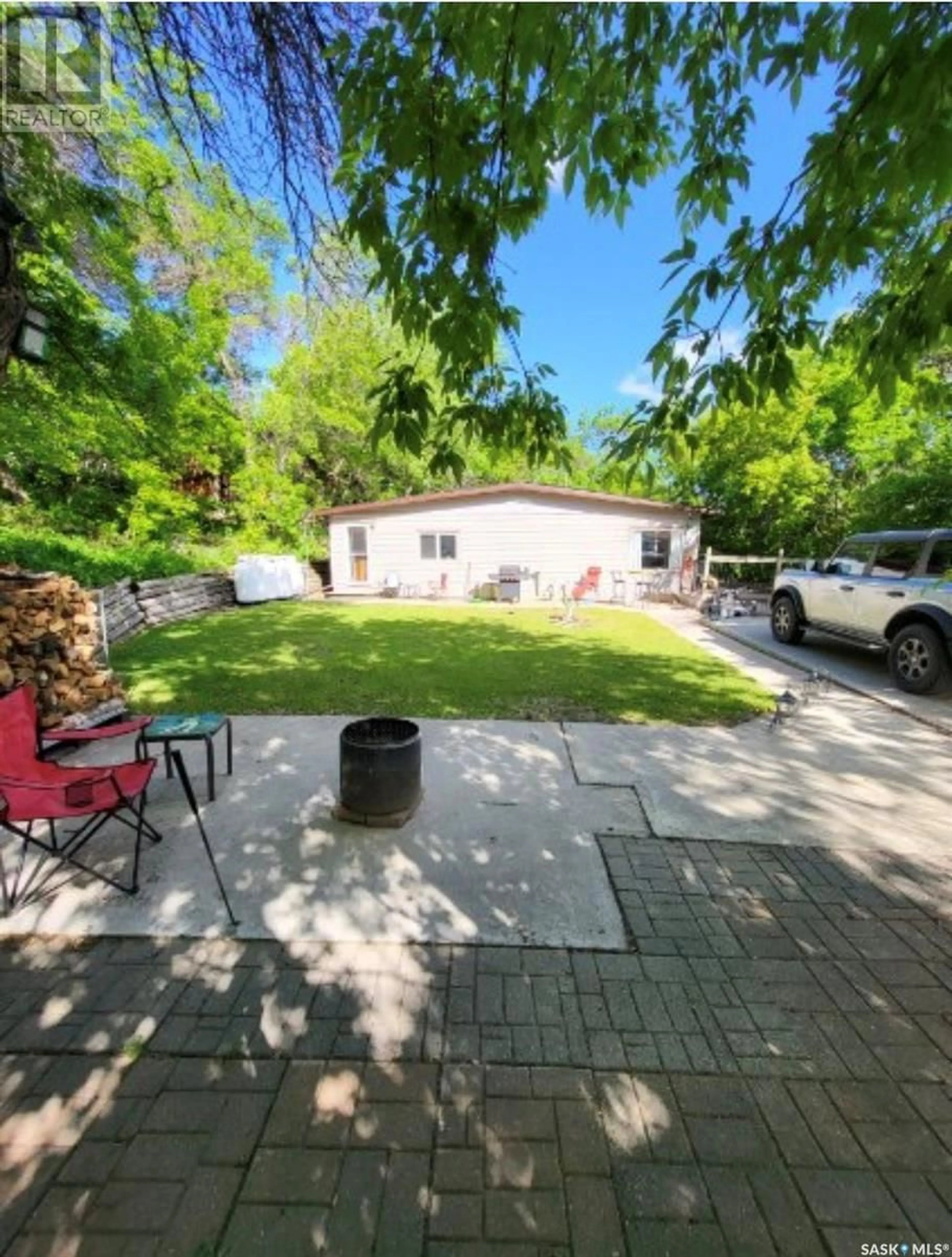 A pic from outside/outdoor area/front of a property/back of a property/a pic from drone, street for 113 Lakeview CRESCENT, Buena Vista Saskatchewan S2V1A8