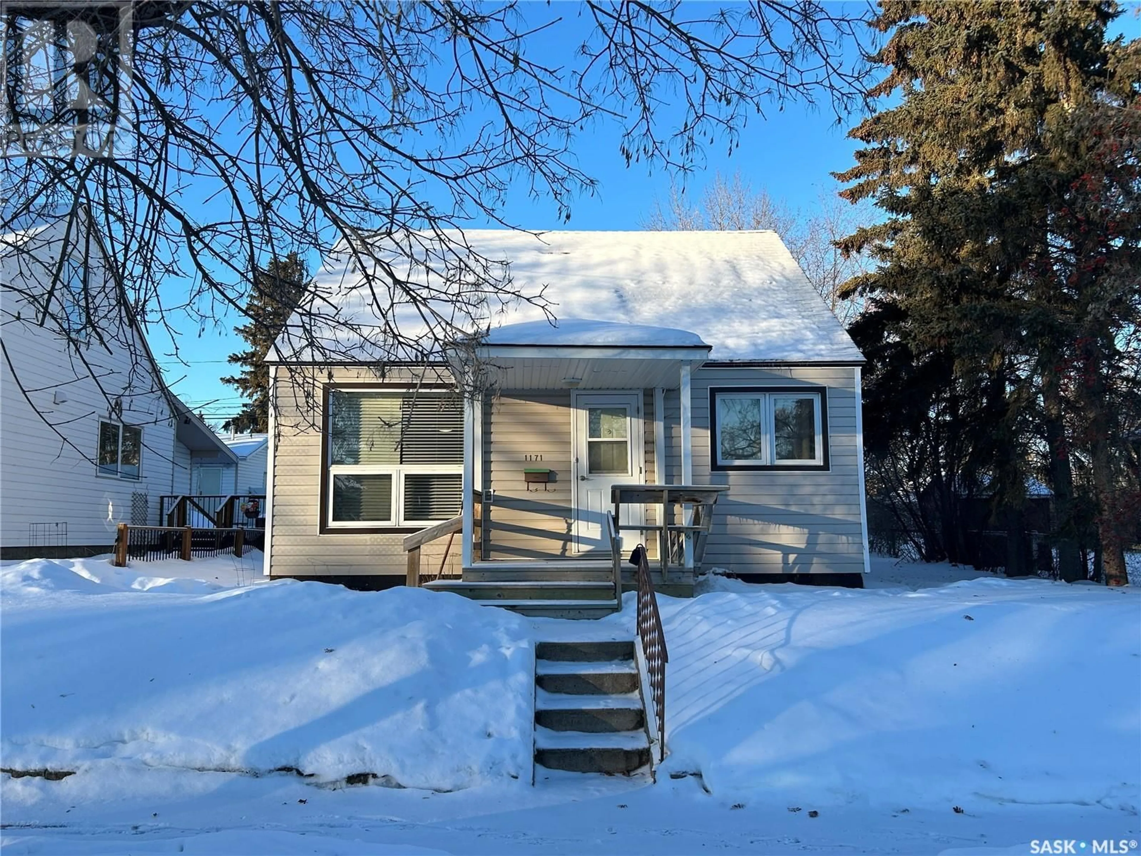 Home with vinyl exterior material, street for 1171 106th STREET, North Battleford Saskatchewan S9A1W8