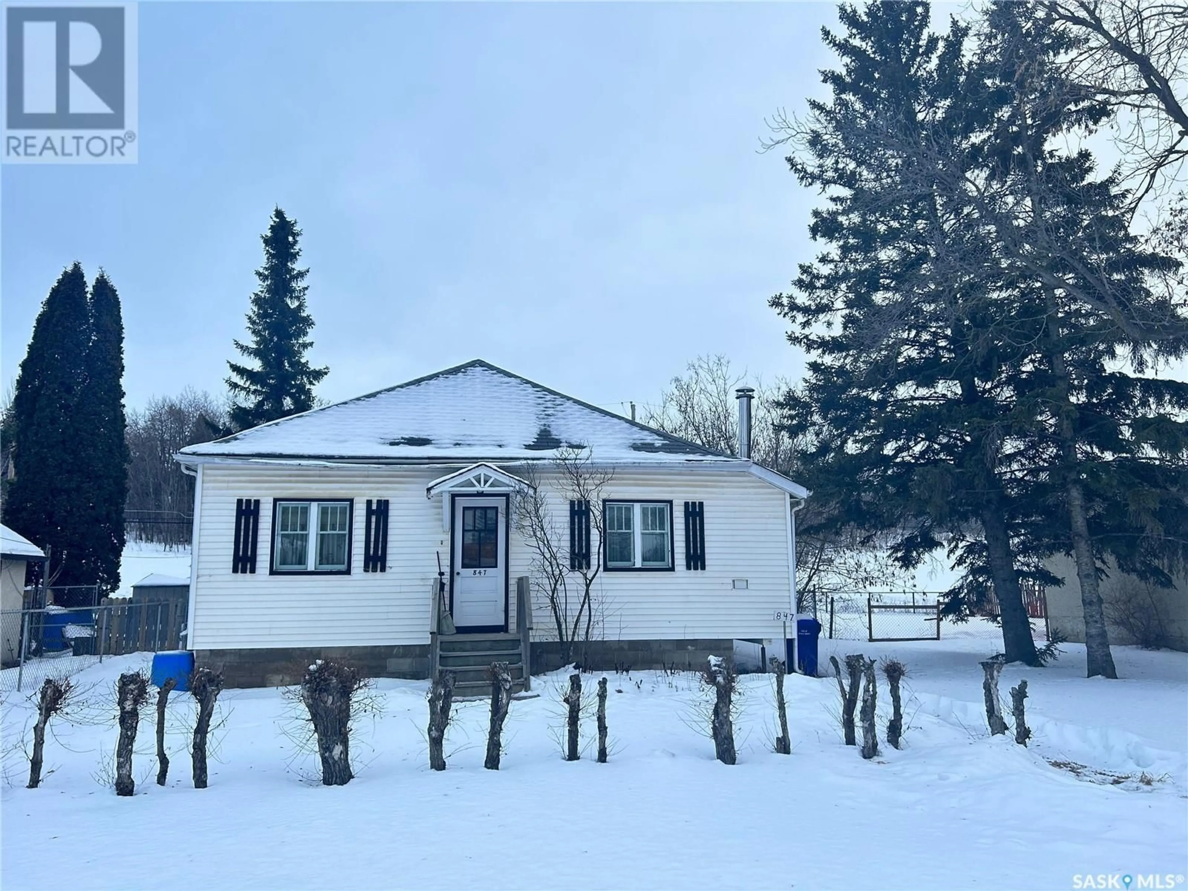 A pic from outside/outdoor area/front of a property/back of a property/a pic from drone, building for 847 18th STREET W, Prince Albert Saskatchewan S6V4A9