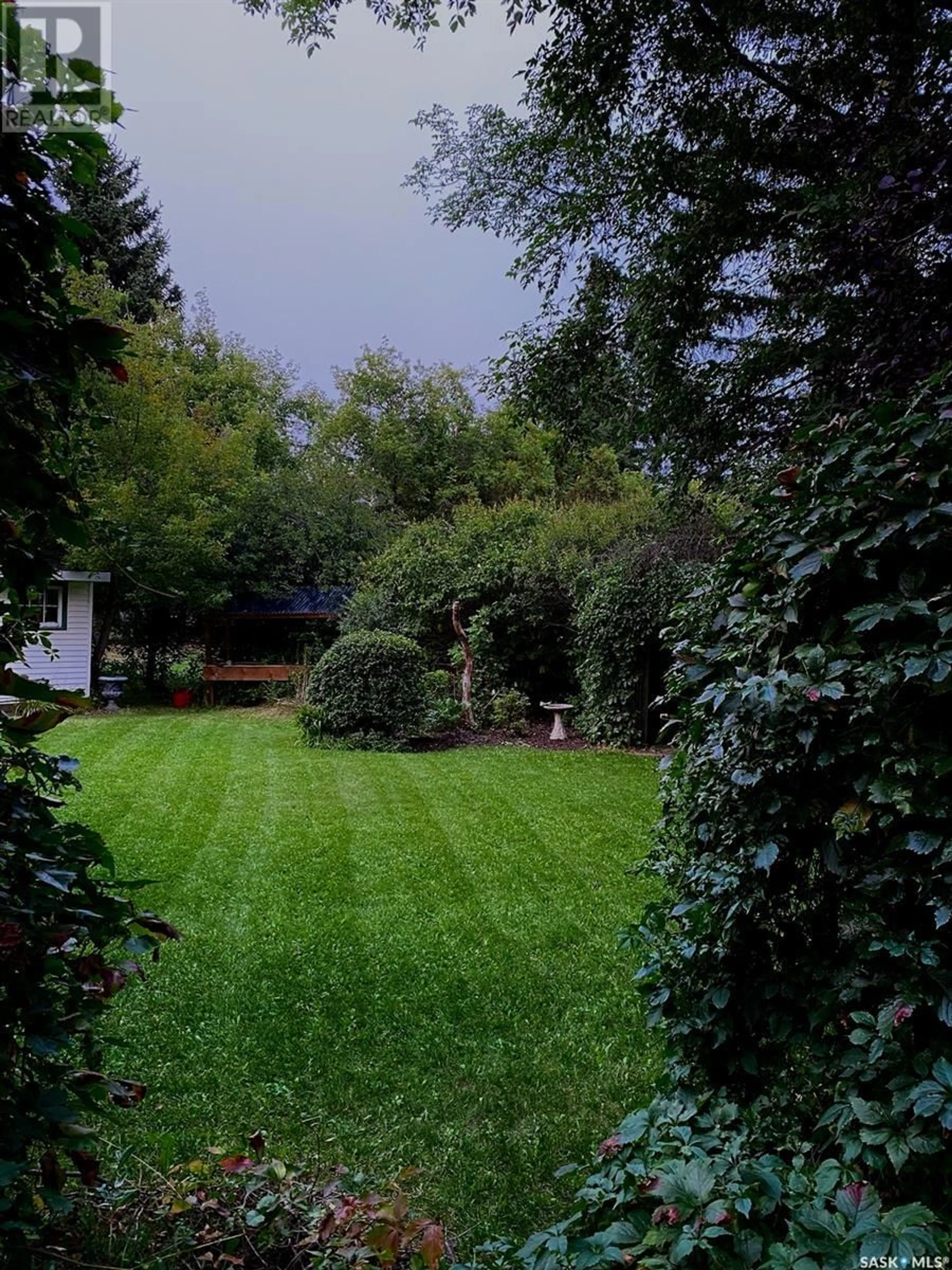 A pic from outside/outdoor area/front of a property/back of a property/a pic from drone, forest/trees view for 1182 112th STREET, North Battleford Saskatchewan S9A2L5