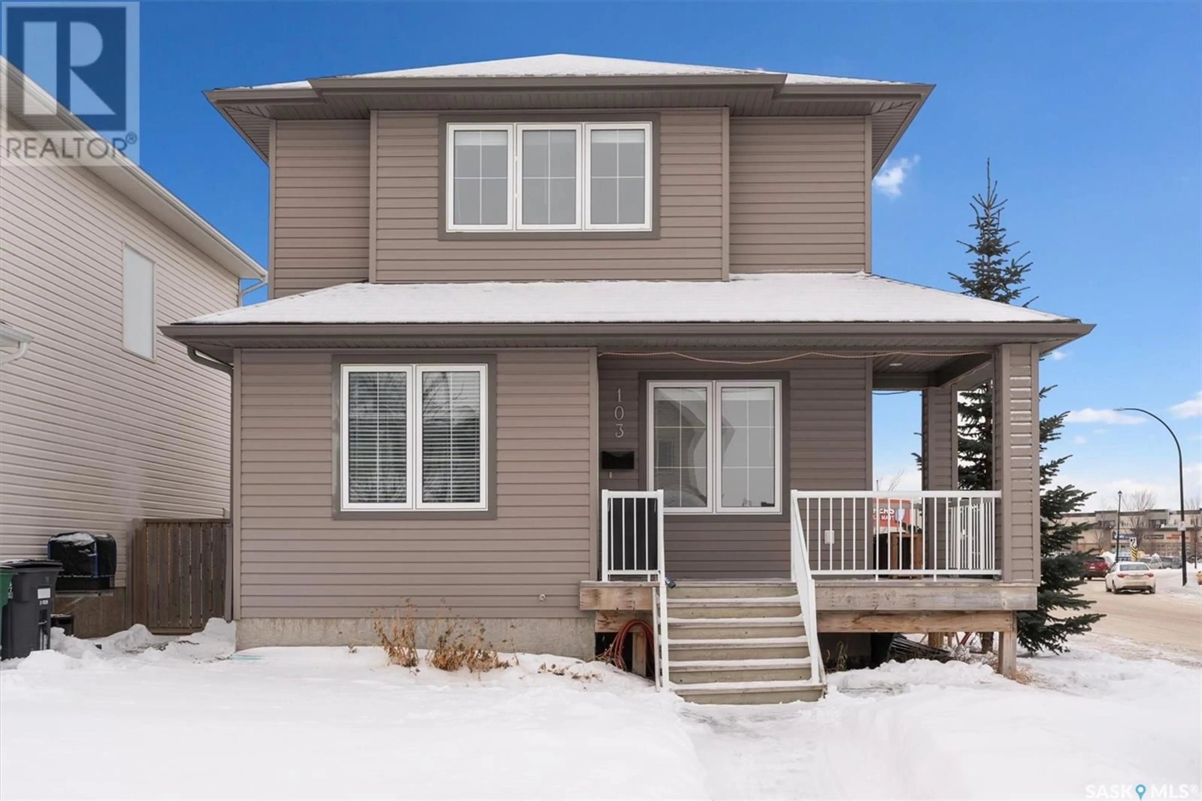 Home with vinyl exterior material, street for 103 Denham CRESCENT, Saskatoon Saskatchewan S7R1E9