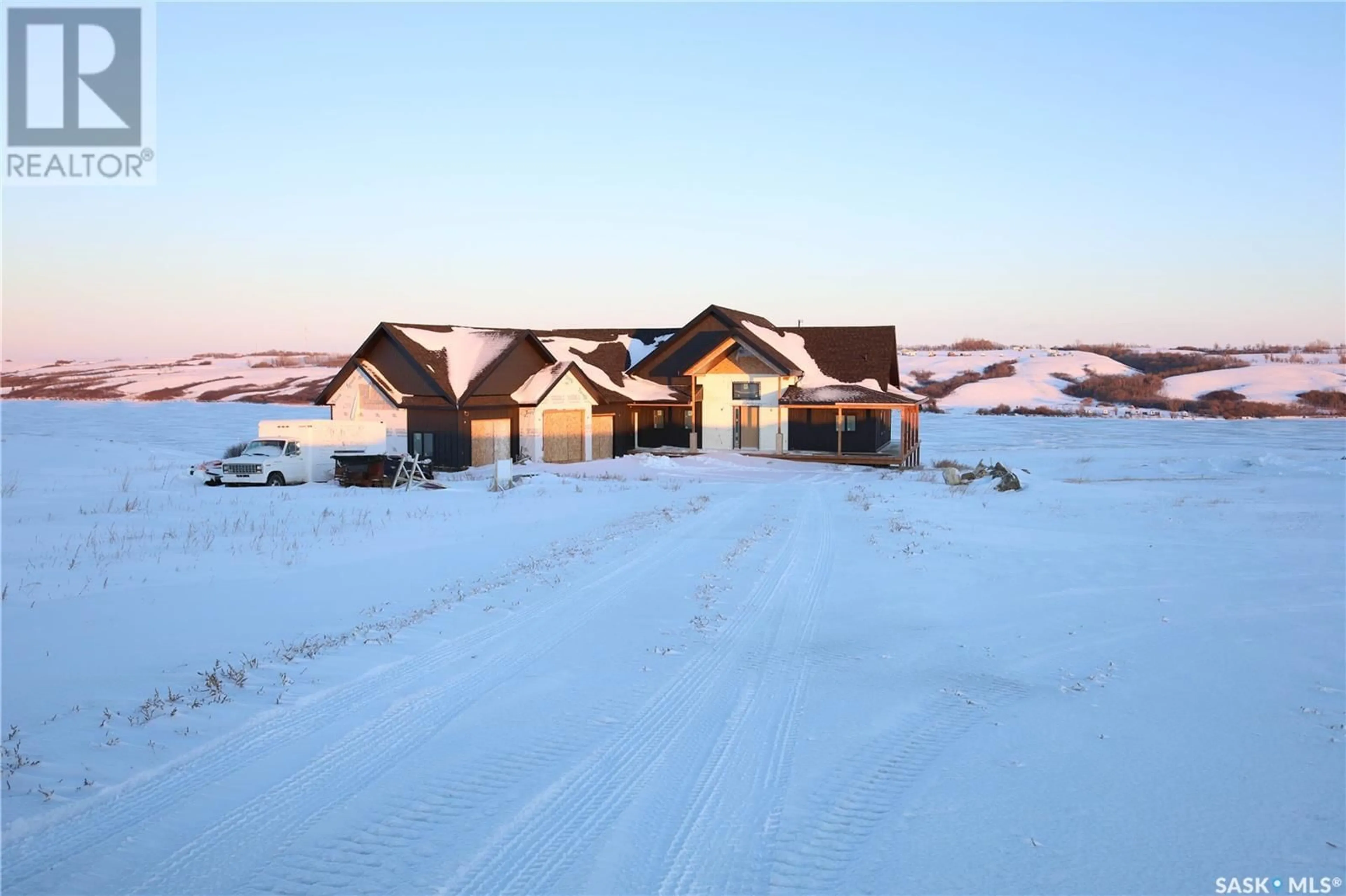 A pic from outside/outdoor area/front of a property/back of a property/a pic from drone, unknown for 82 Sunrise DRIVE, Blackstrap Skyview Saskatchewan S0K1K0