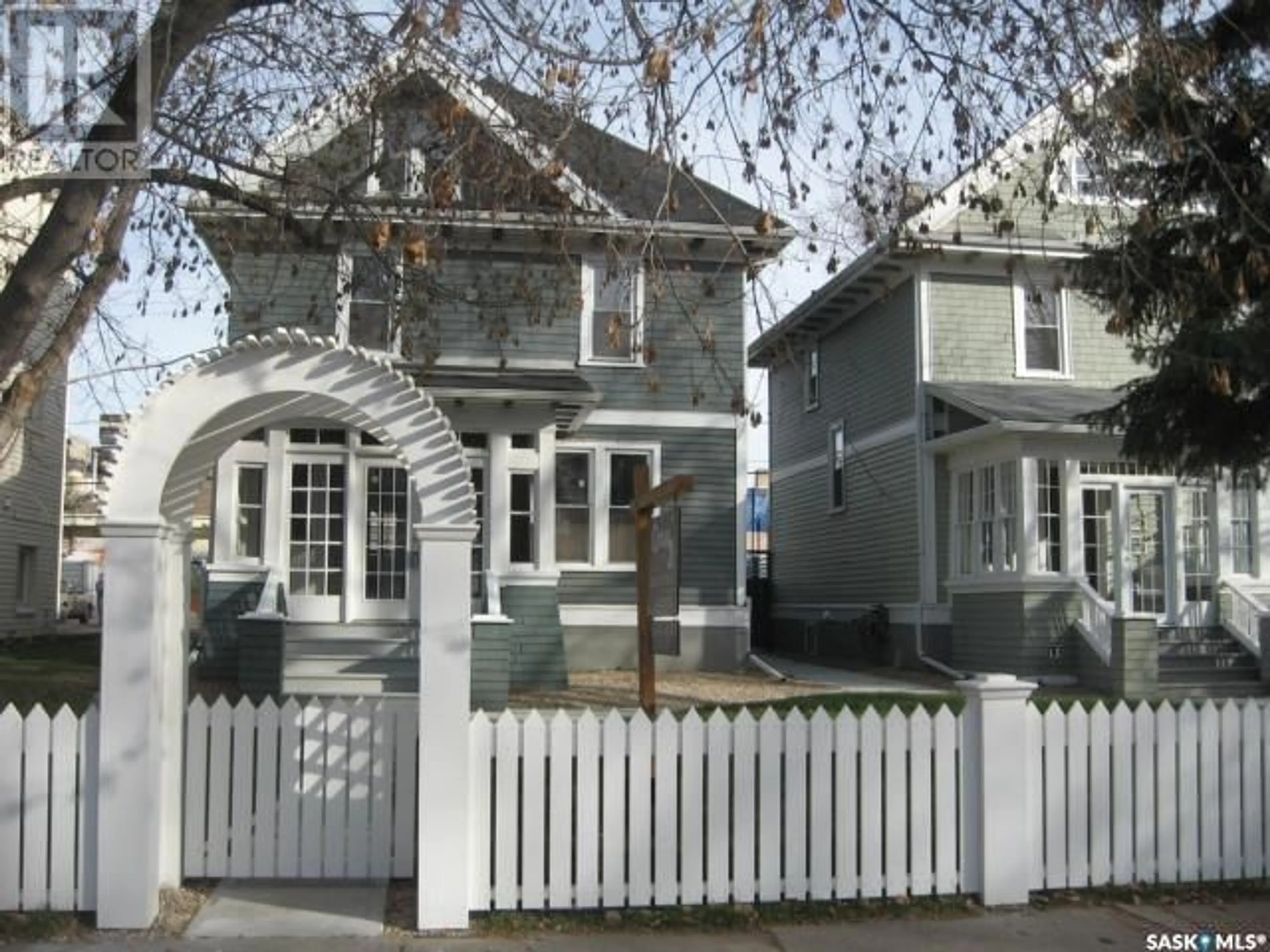 Home with vinyl exterior material, street for 2143 Angus STREET, Regina Saskatchewan S4T2A1