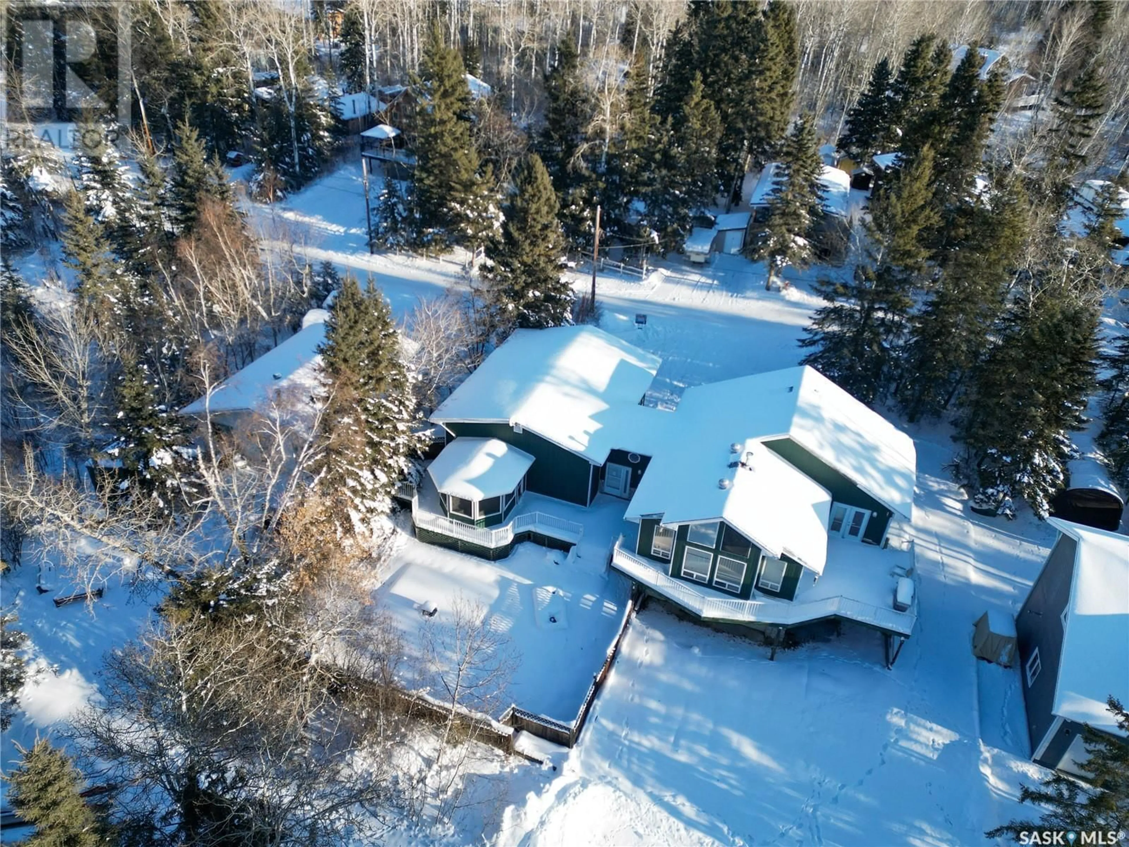 A pic from outside/outdoor area/front of a property/back of a property/a pic from drone, unknown for 232 Jacobson DRIVE, Christopher Lake Saskatchewan S0J0N0