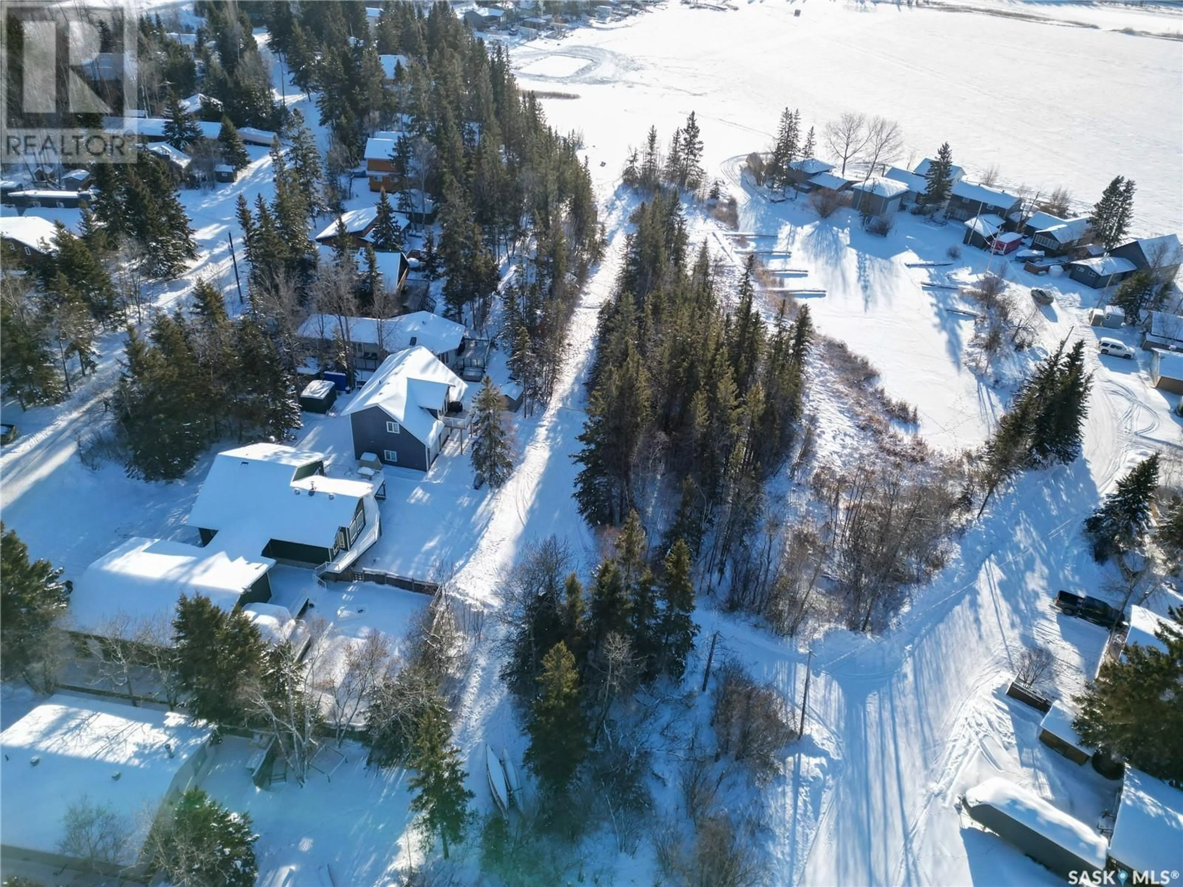 A pic from outside/outdoor area/front of a property/back of a property/a pic from drone, street for 232 Jacobson DRIVE, Christopher Lake Saskatchewan S0J0N0